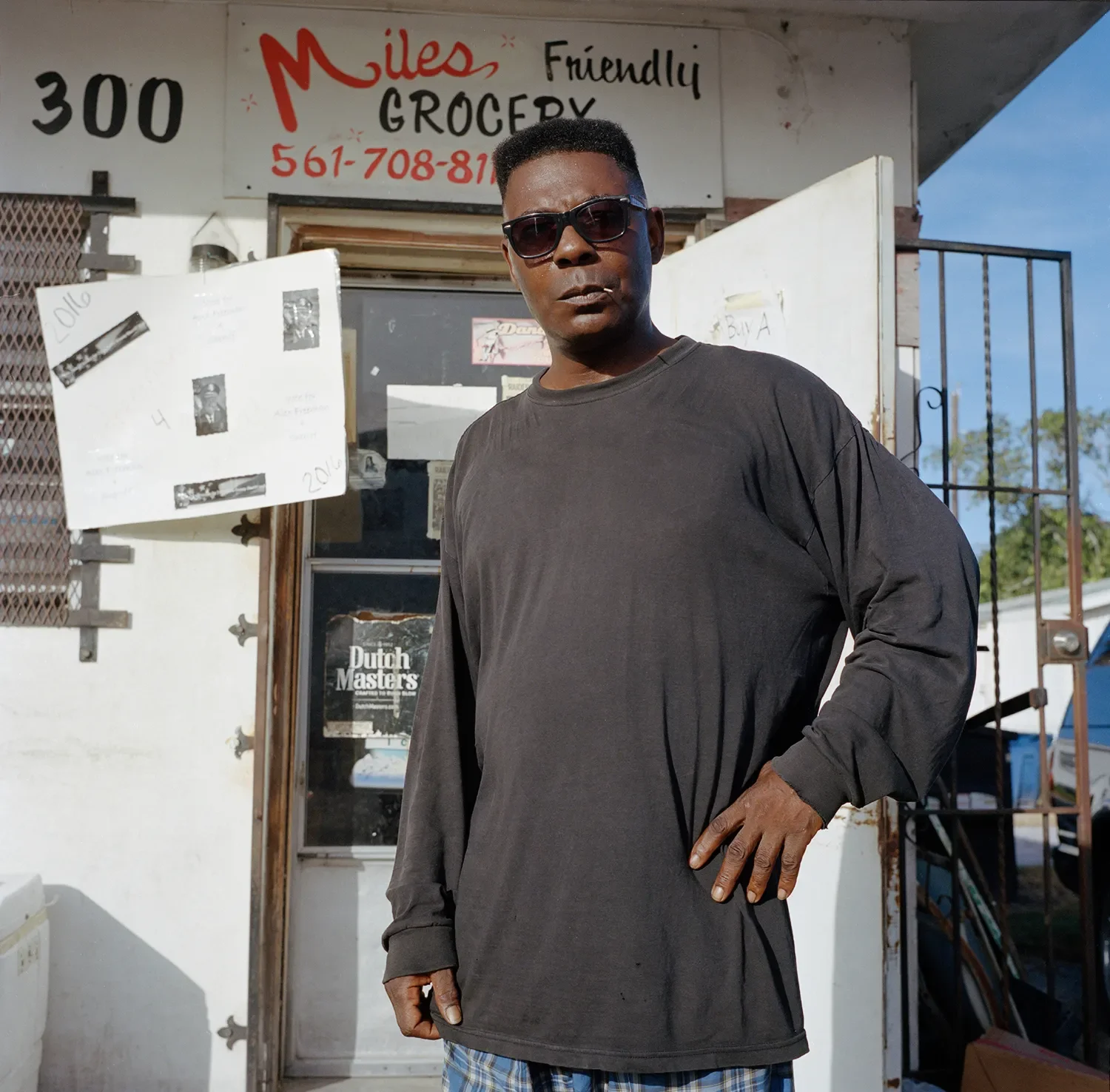 "Robo", a local Belle Glade resident outside of his job where he works as a store clerk.