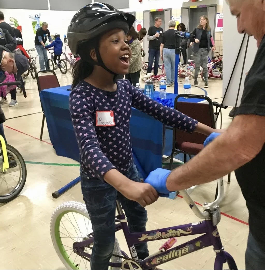 Excited child on bike