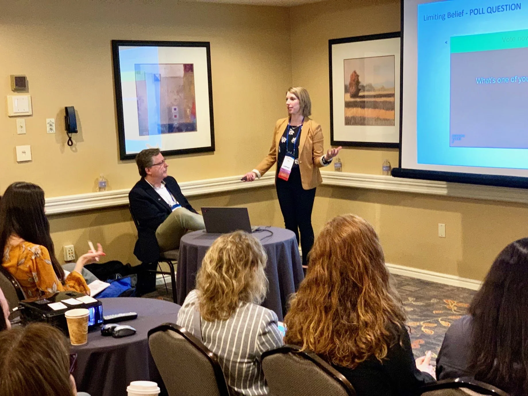 Beth presenting at a conference