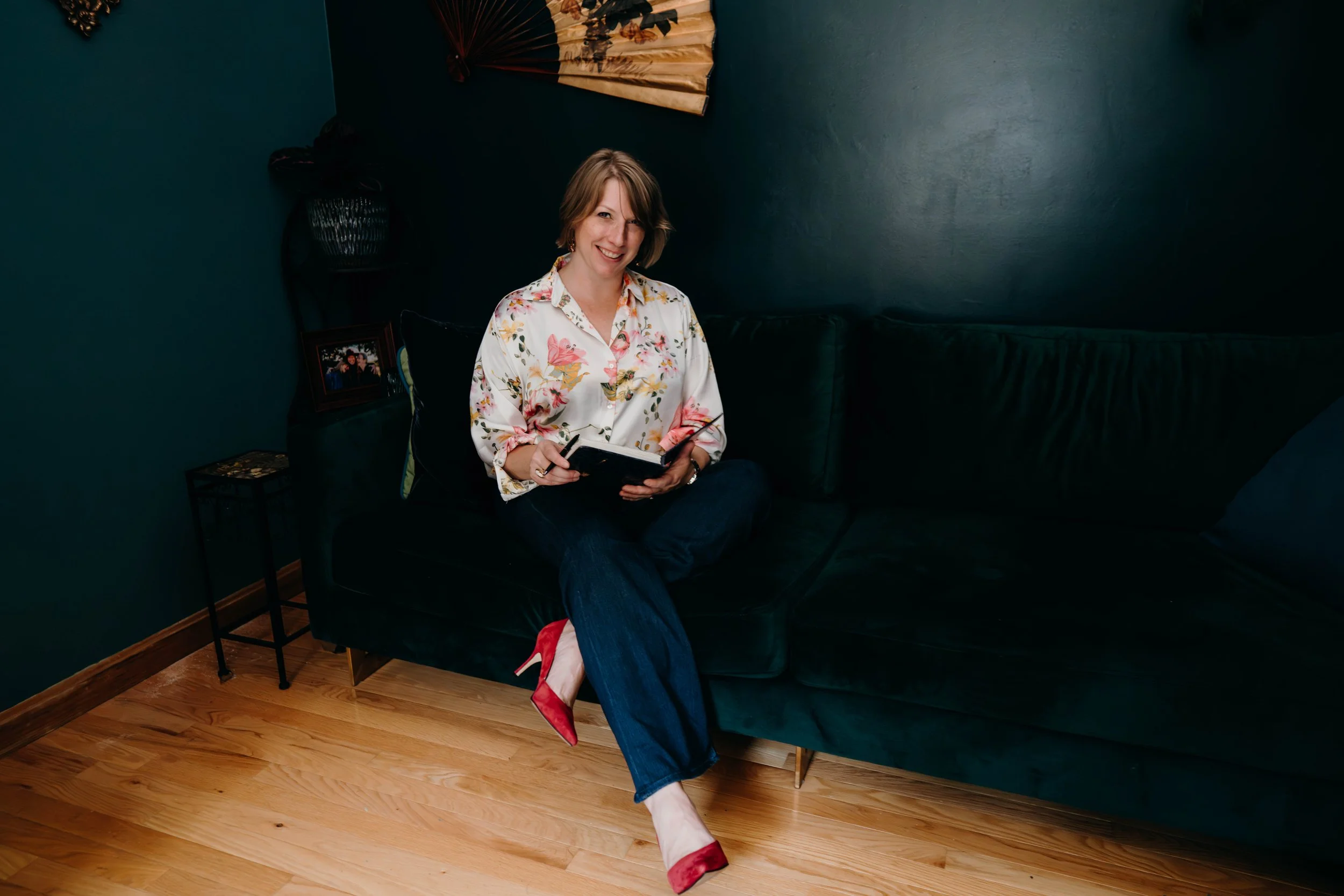 Beth in her office waiting to work with a coaching client