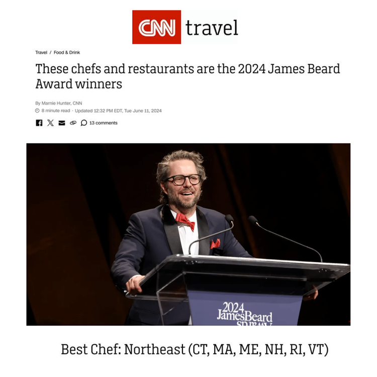 CNN Travel article about the 2024 James Beard Award winners, featuring David Standridge standing at a podium with a smile, on a stage with a dark background.