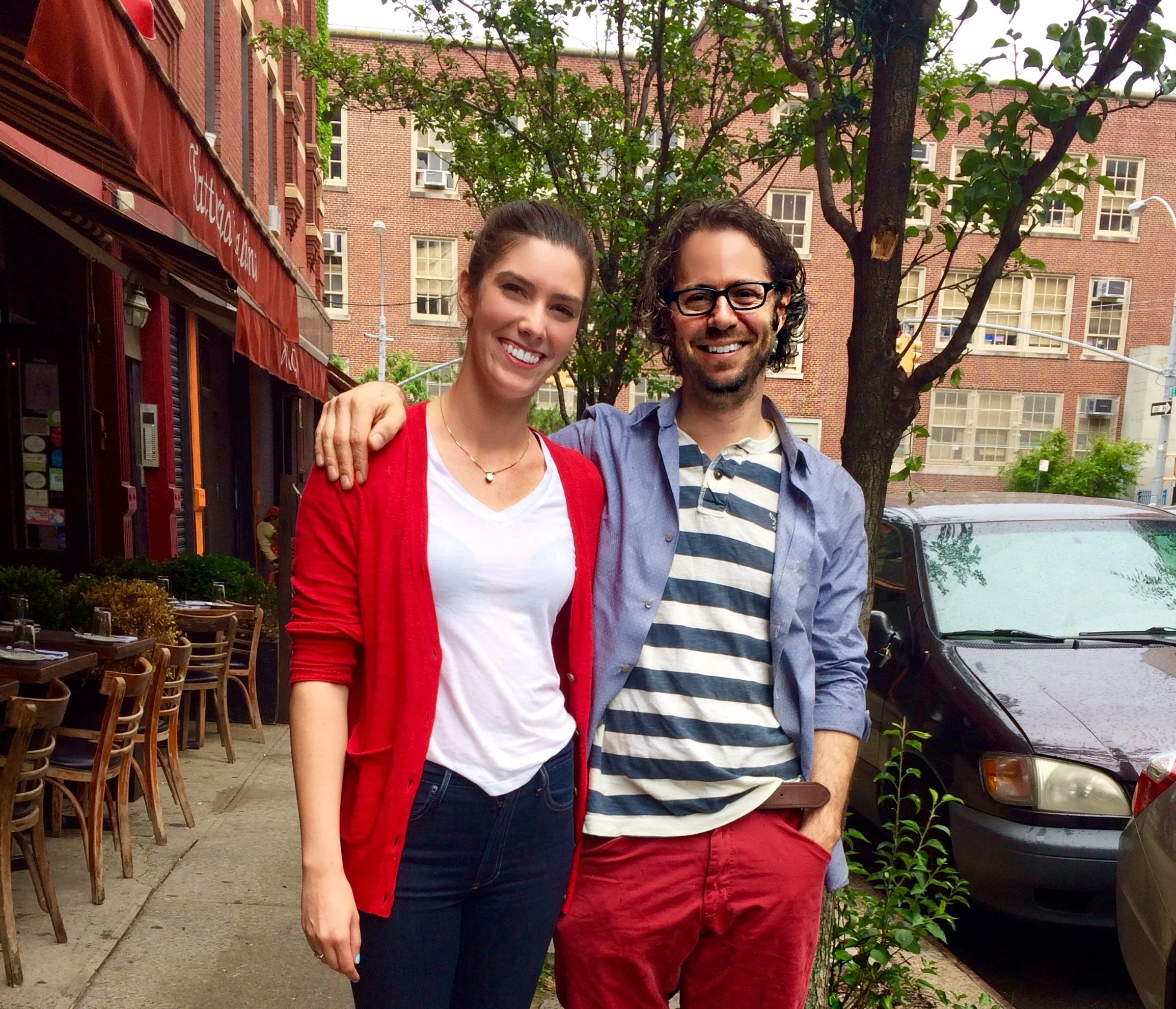 Kathleen and David Standridge standing outside Lavagna Restaurant in the East Village of New York City. The place where they met in 2014