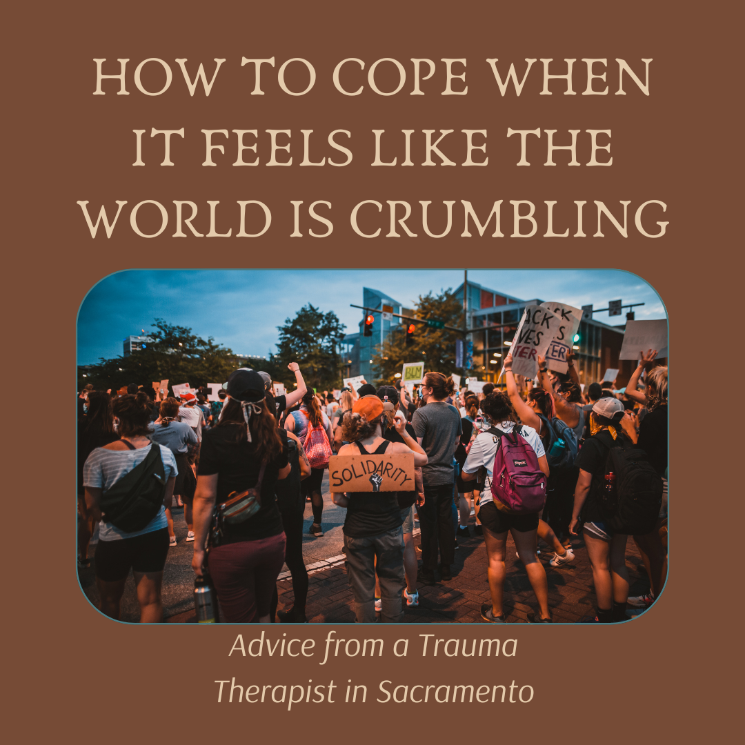 group of people at protest above advice from trauma therapist sacramento