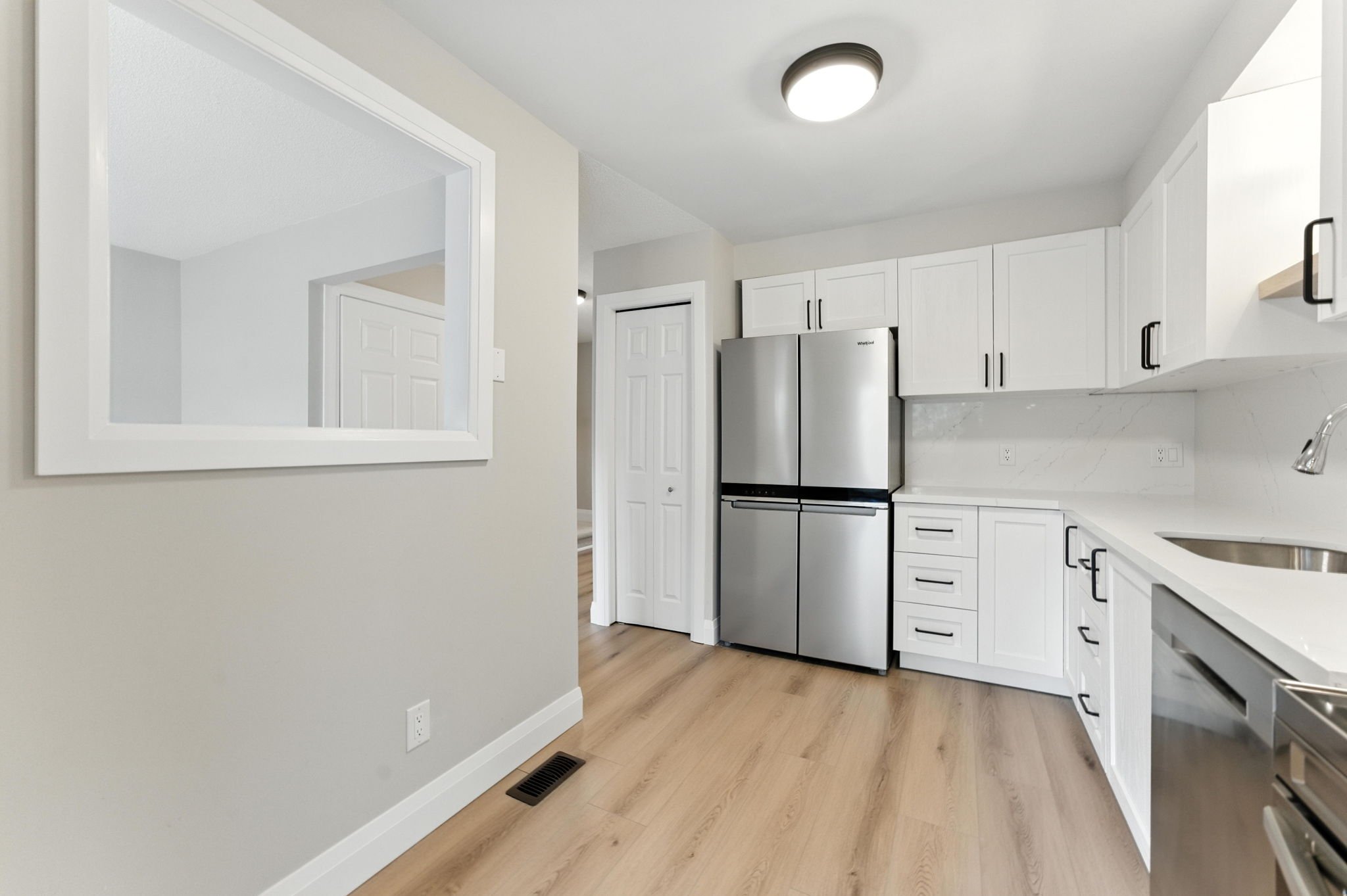 Open-concept kitchen designed to connect seamlessly with the main living spaces.