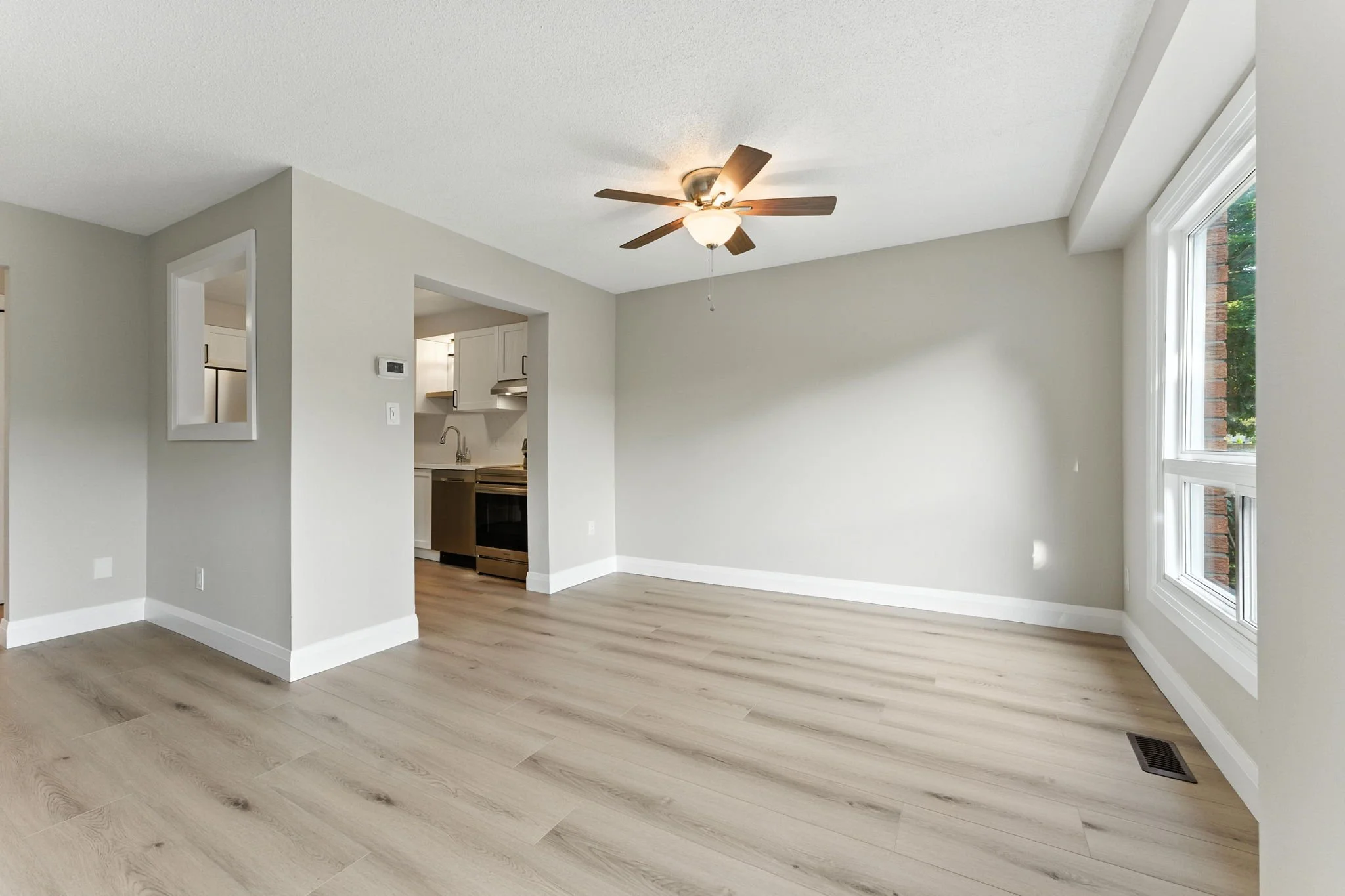 Open main floor with improved layout and seamless flow between living spaces.