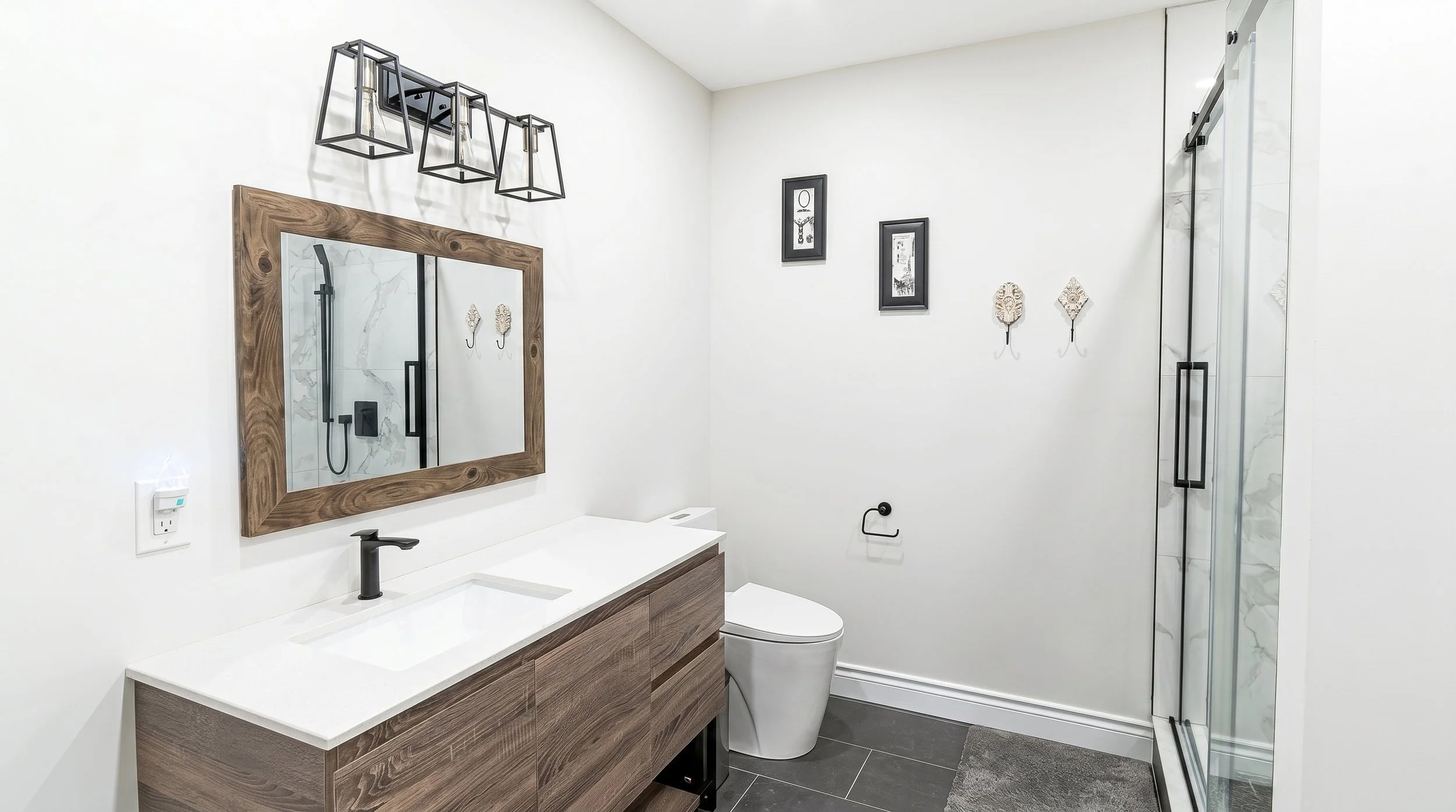Contemporary bathroom renovation with a custom vanity, modern fixtures and clean, timeless finishes.