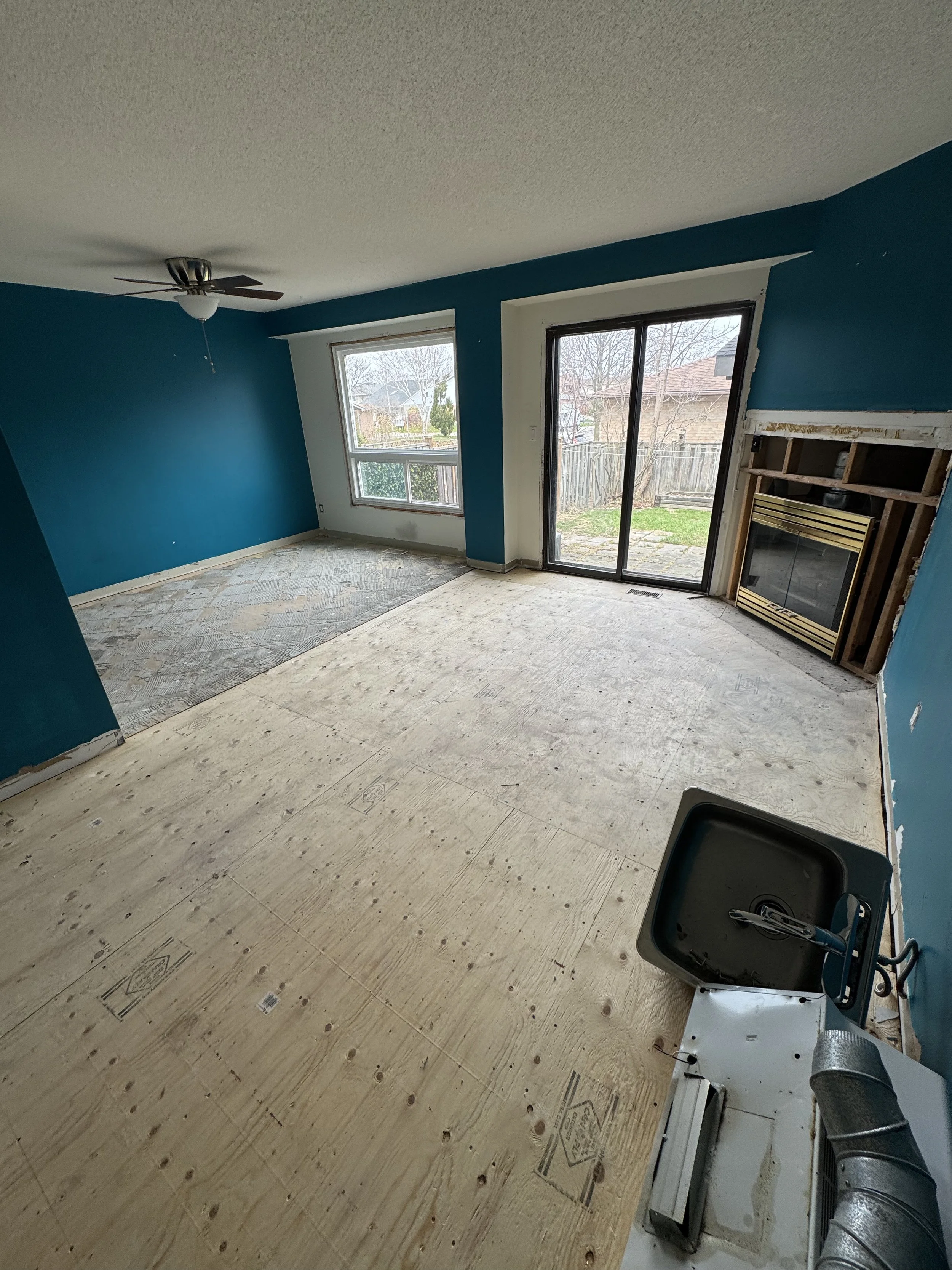 Existing family room during demolition and full home renovation.