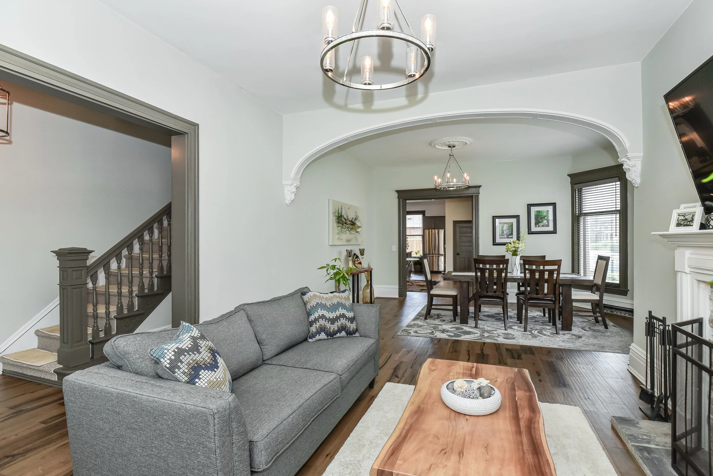 Open-concept living room and dining area designed for natural light and effortless flow.