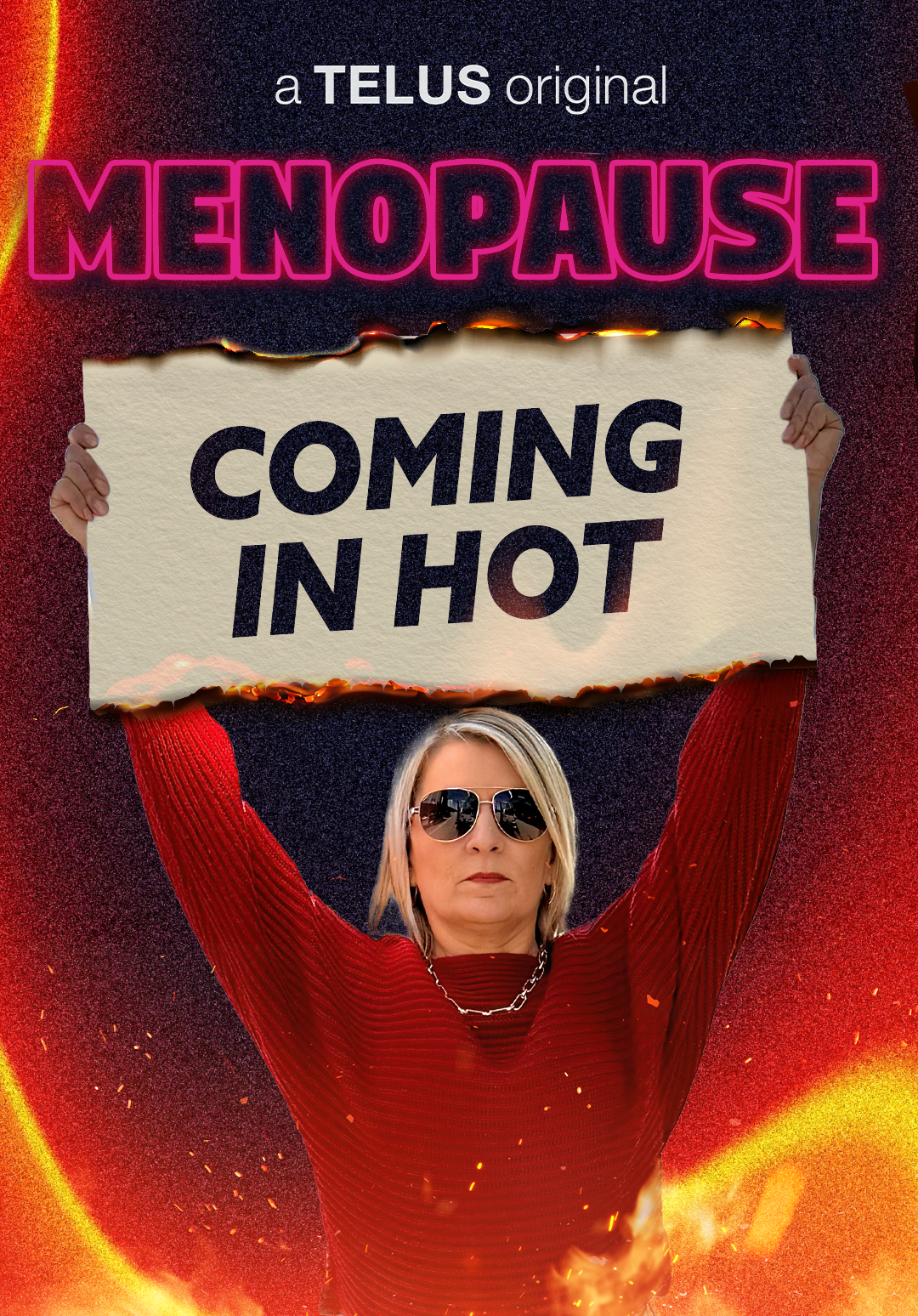 A woman wearing sunglasses and a red shirt holds a torn sign that says "Coming in Hot" in front of a fiery background with neon text "Menopause" and "a TELUS original."