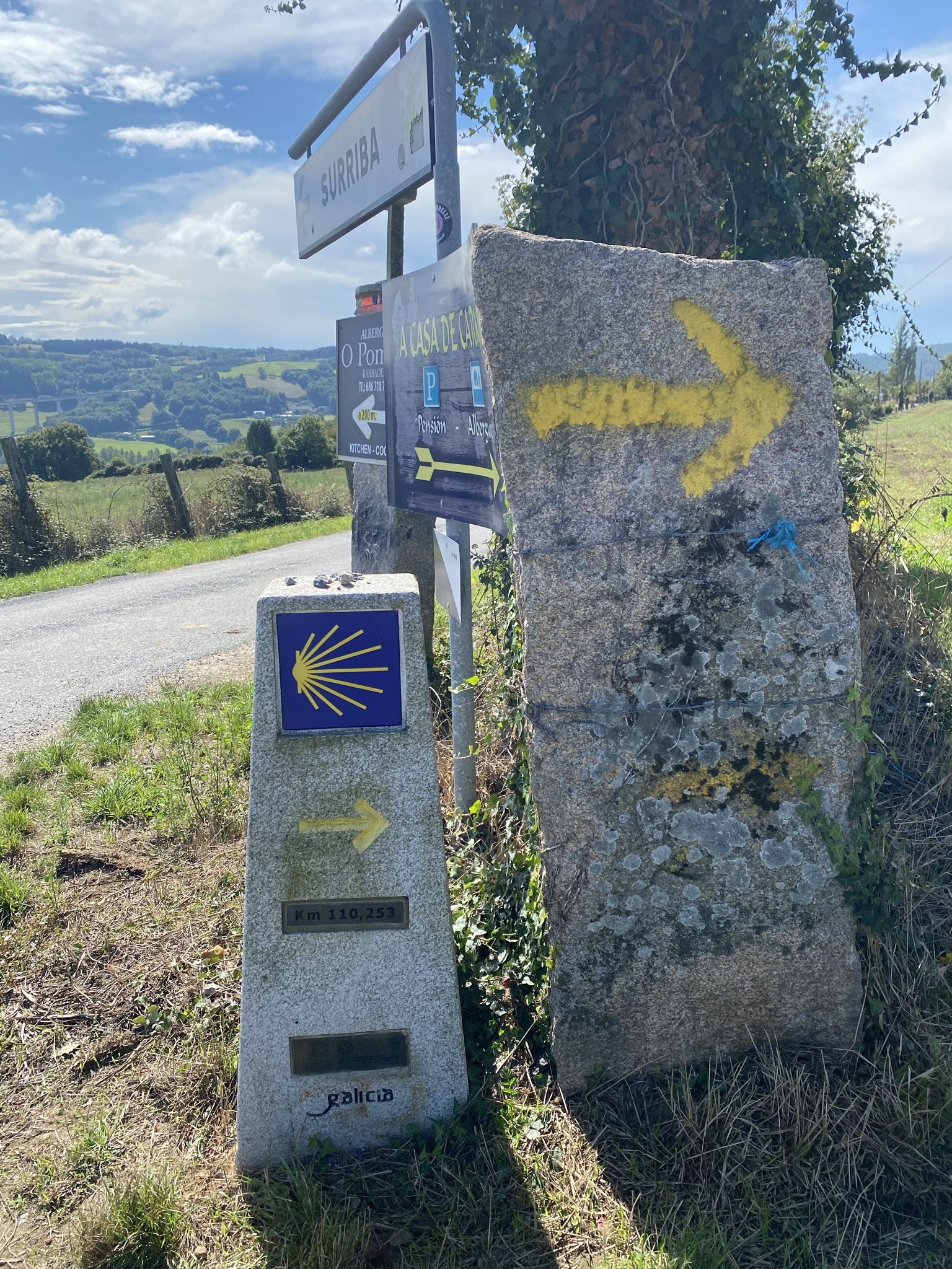 Following the signs on El Camino de Santiago, less than 100 kilometers to go