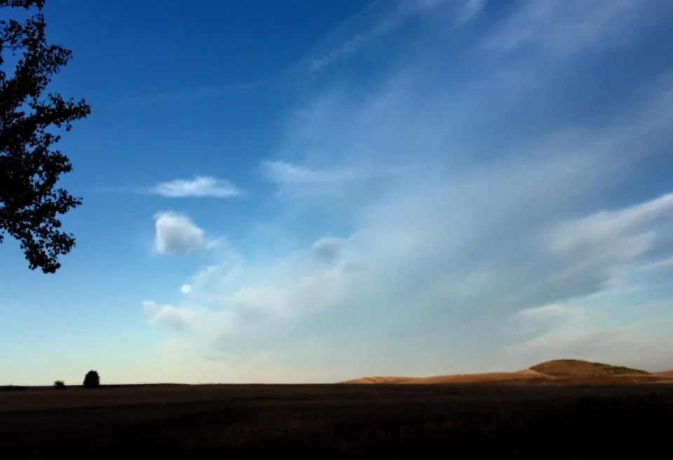 Open plains and blue sky during The Timeless Trek, a Mindful Adventure on El Camino
