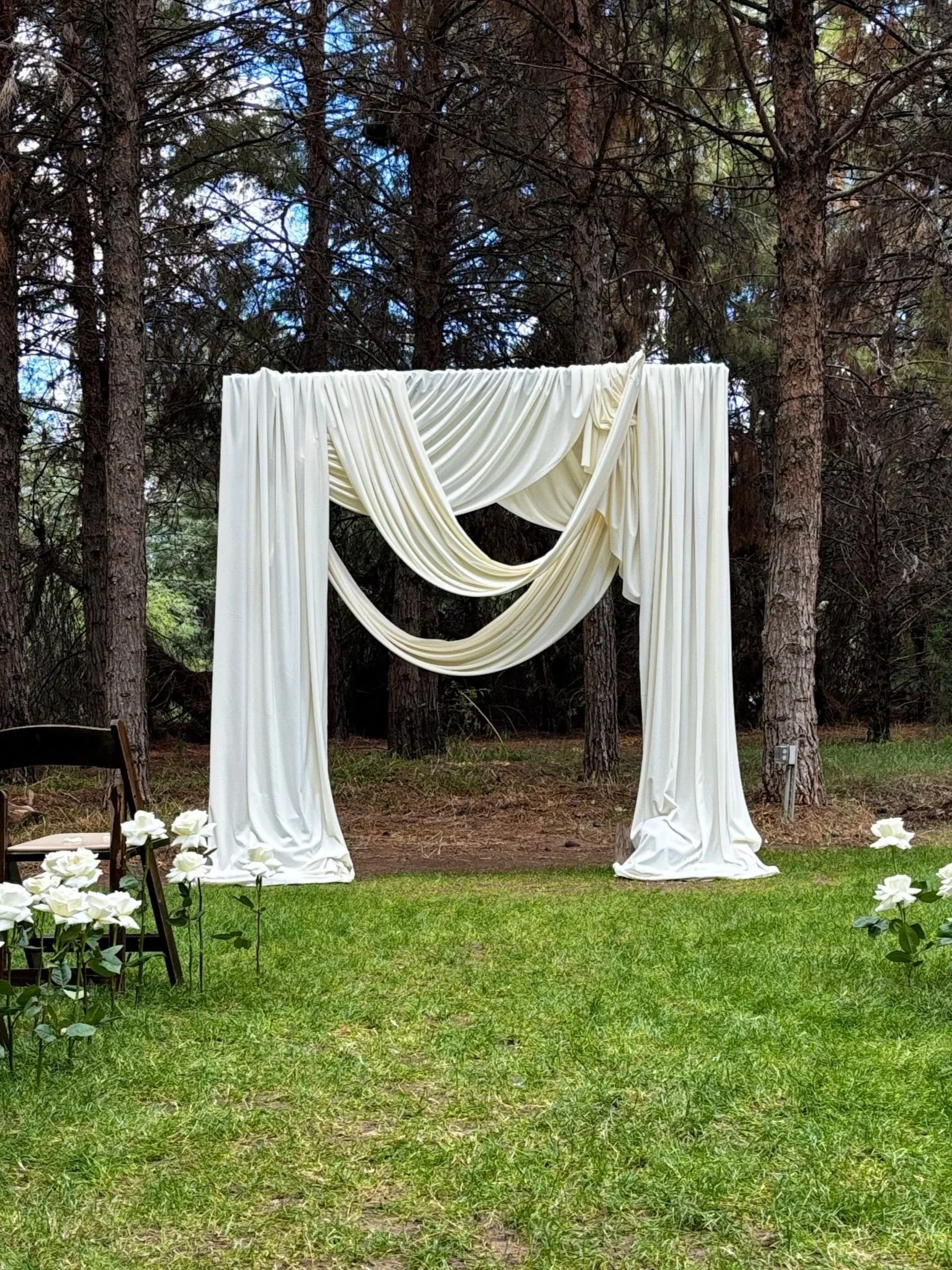 outdoor draping of an arbor at schneps farm in queen creek