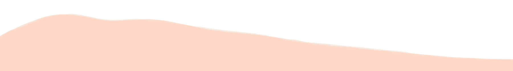 A pinkish-beige sand dune with a smooth curve.