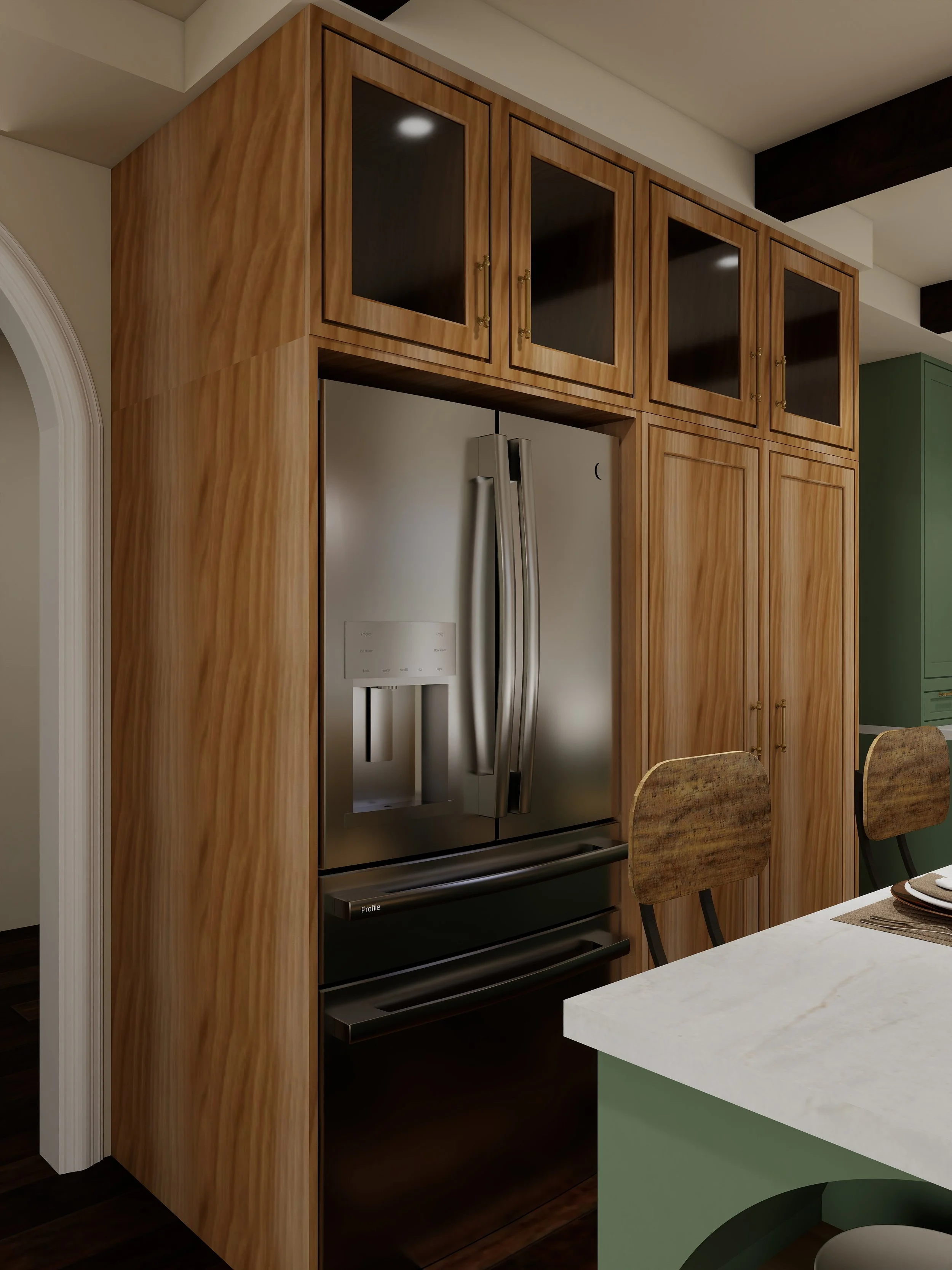 Kitchen with wooden cabinets and stainless steel refrigerator. Part of a dining table with chairs is visible in the foreground.