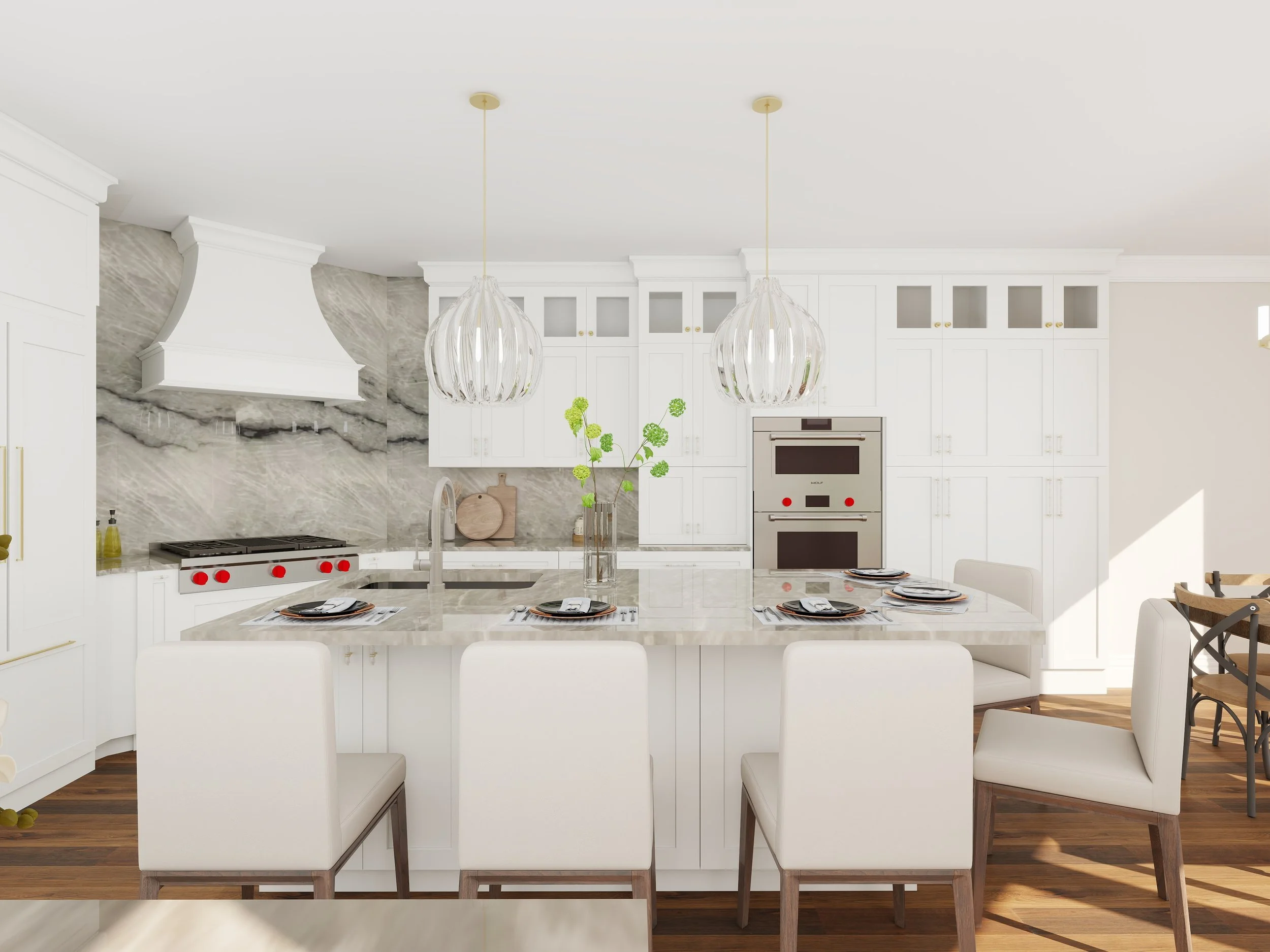 A modern kitchen with white cabinets, a marble backsplash, and two glass pendant lights hanging above a marble island. The kitchen also features a double oven and a vase with green flowers on the island. There are dining chairs around the island and 