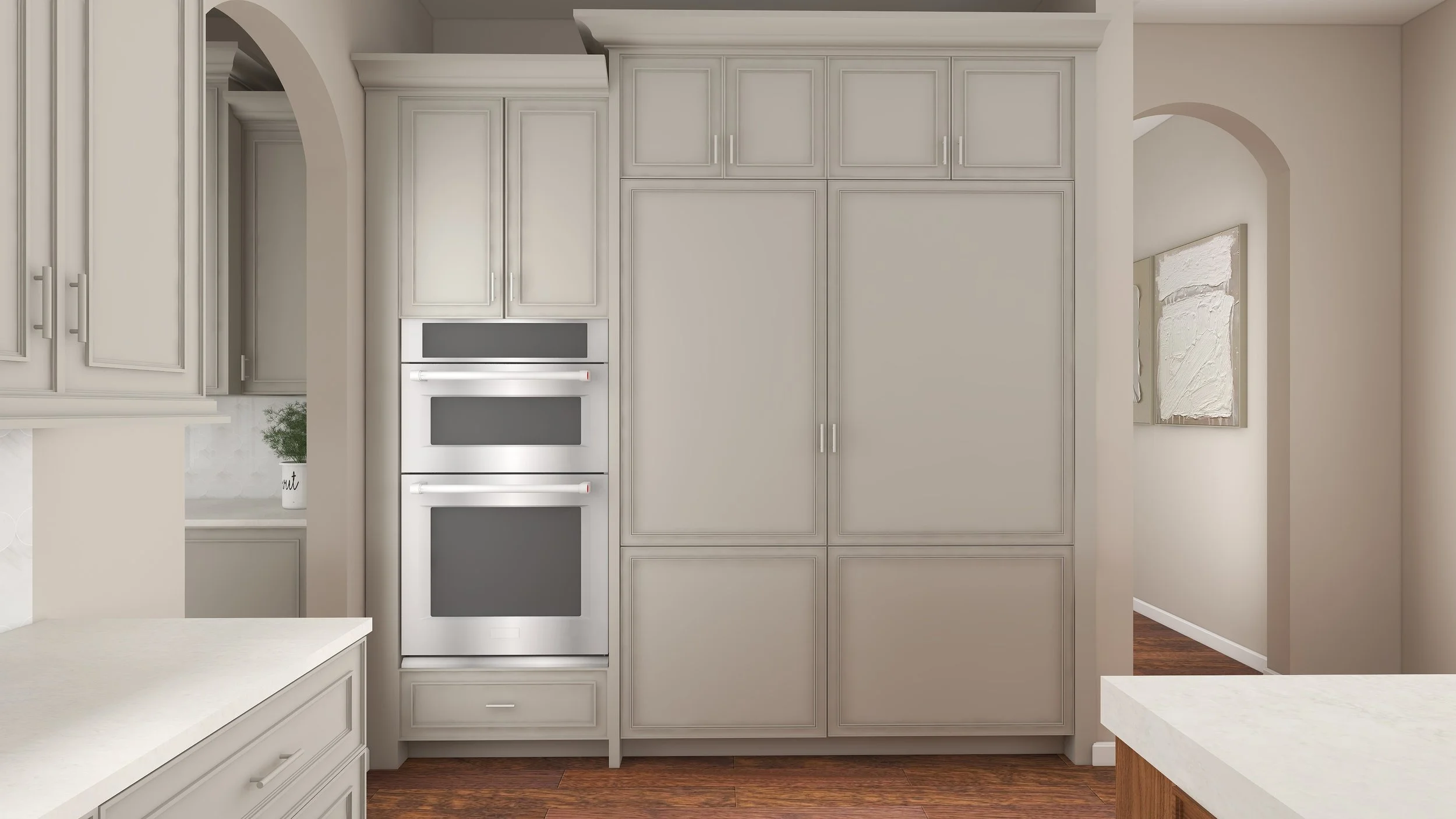 Modern kitchen with white cabinetry and a built-in double oven, marble countertops, and hardwood flooring.