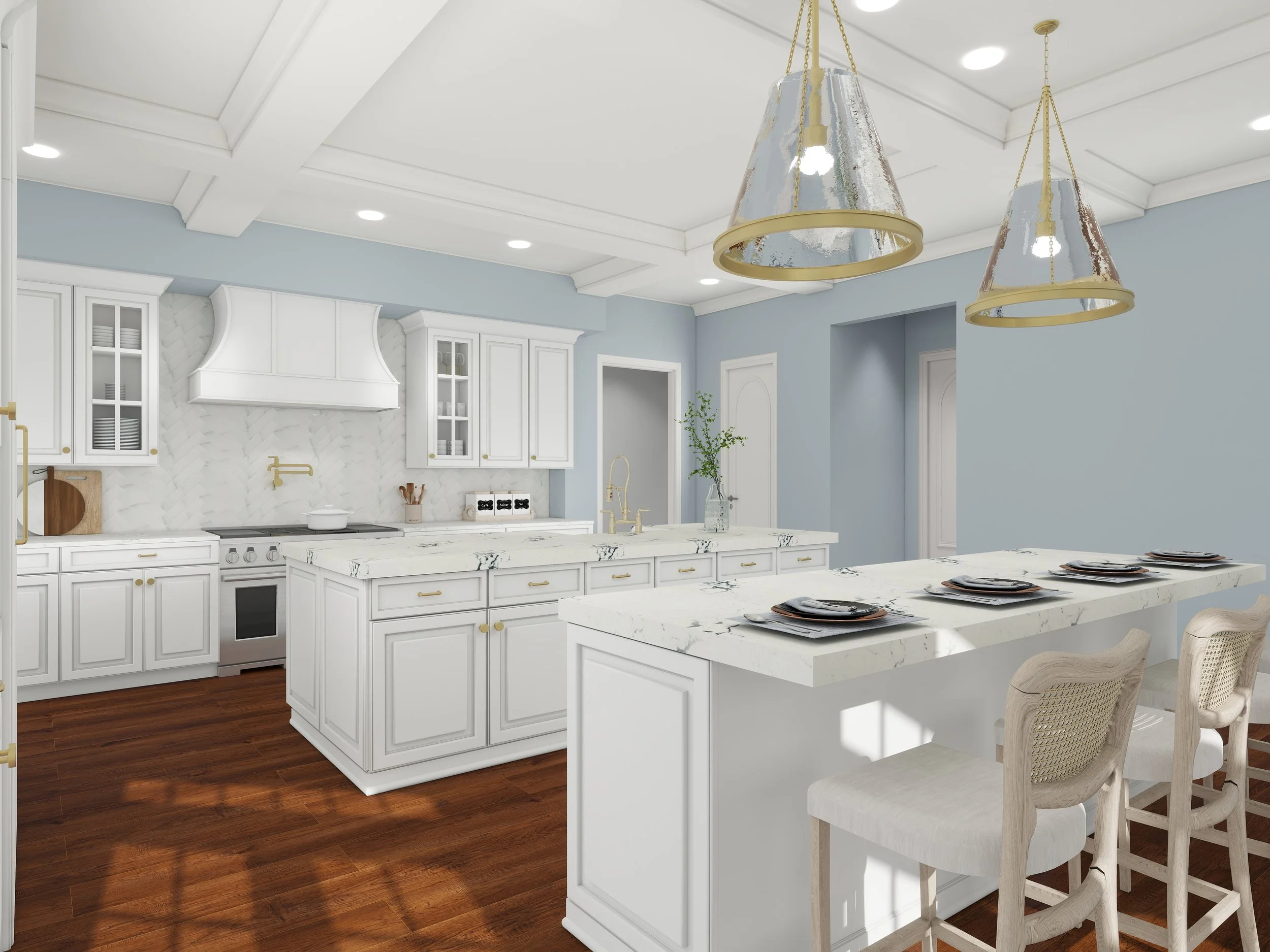A modern kitchen with white cabinetry, marble countertops, a kitchen island with seating, and metallic pendant lights hanging from a white ceiling with recessed lighting. The kitchen has a light blue wall and dark wooden flooring.