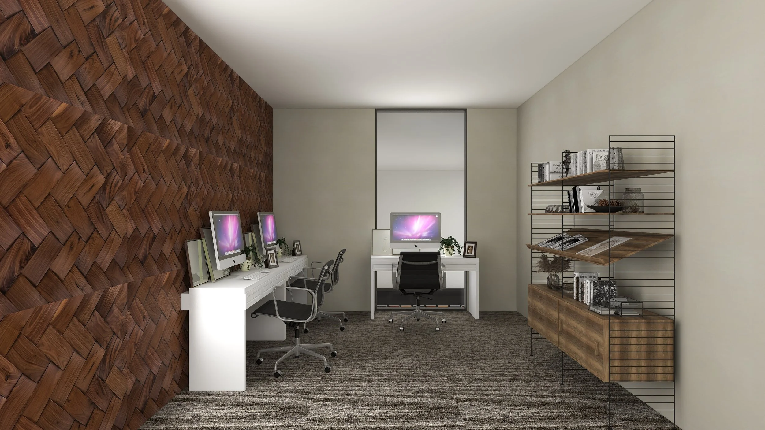 Home office with a wooden accent wall, white desk with three iMac computers, black chairs, and a black metal bookshelf with books and decorative items.