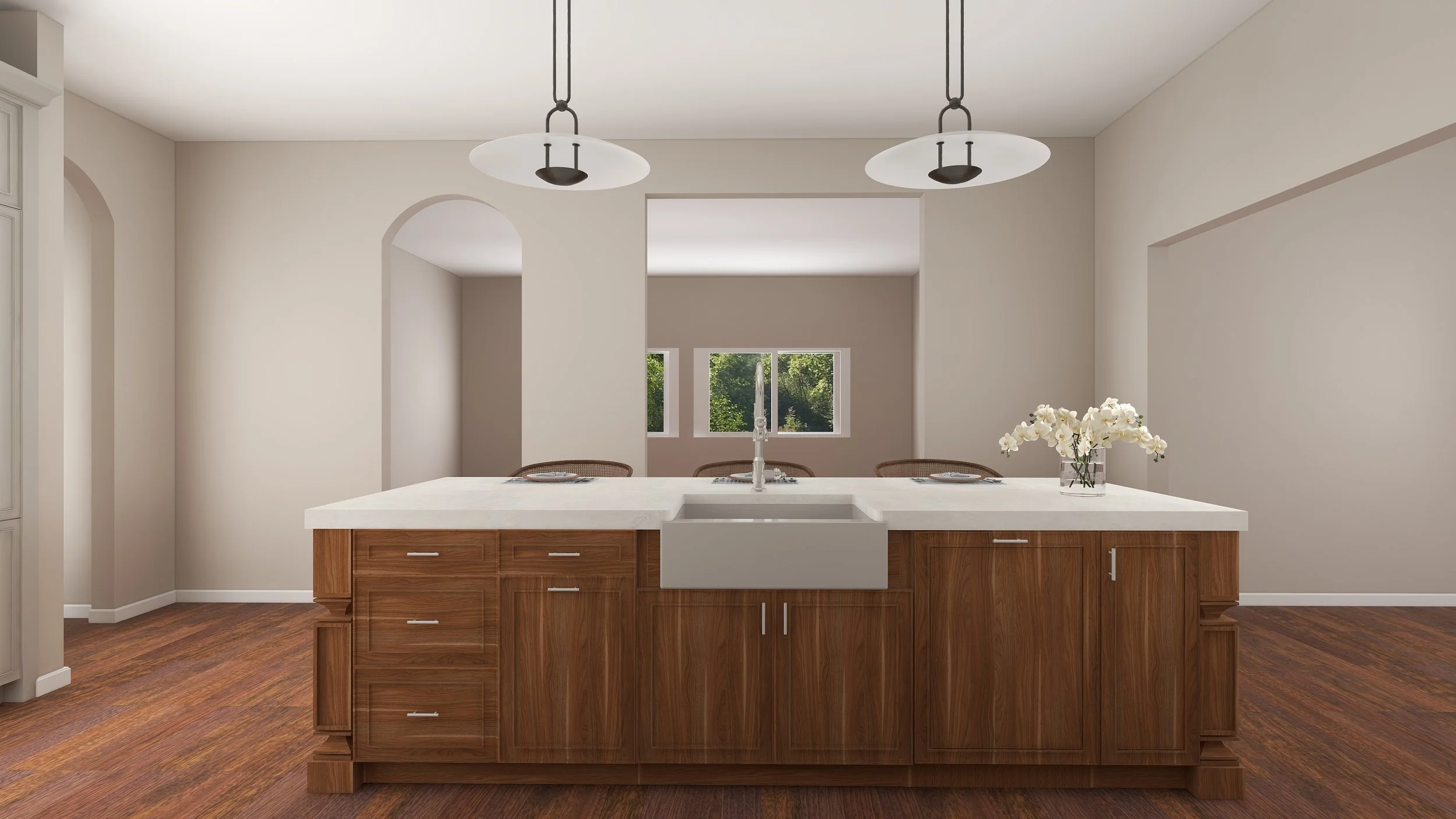 Kitchen island with a white countertop, a farmhouse sink, a faucet, and a vase of white flowers, with two rustic pendant lights overhead and windows overlooking green trees in the background.