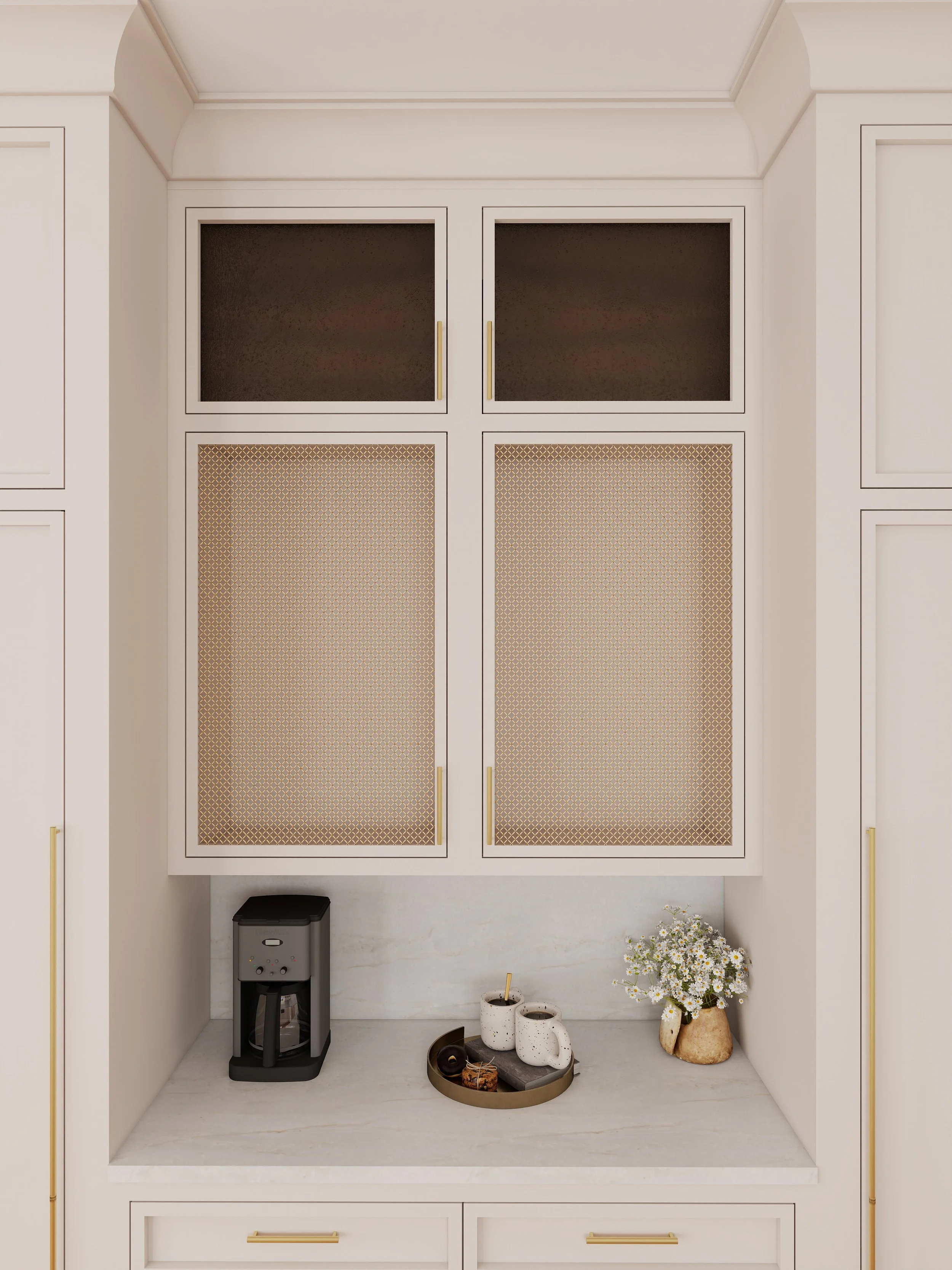 White kitchen cabinet with open space in the middle, a coffee maker on the left, flower vases, and a tray with items on a countertop.