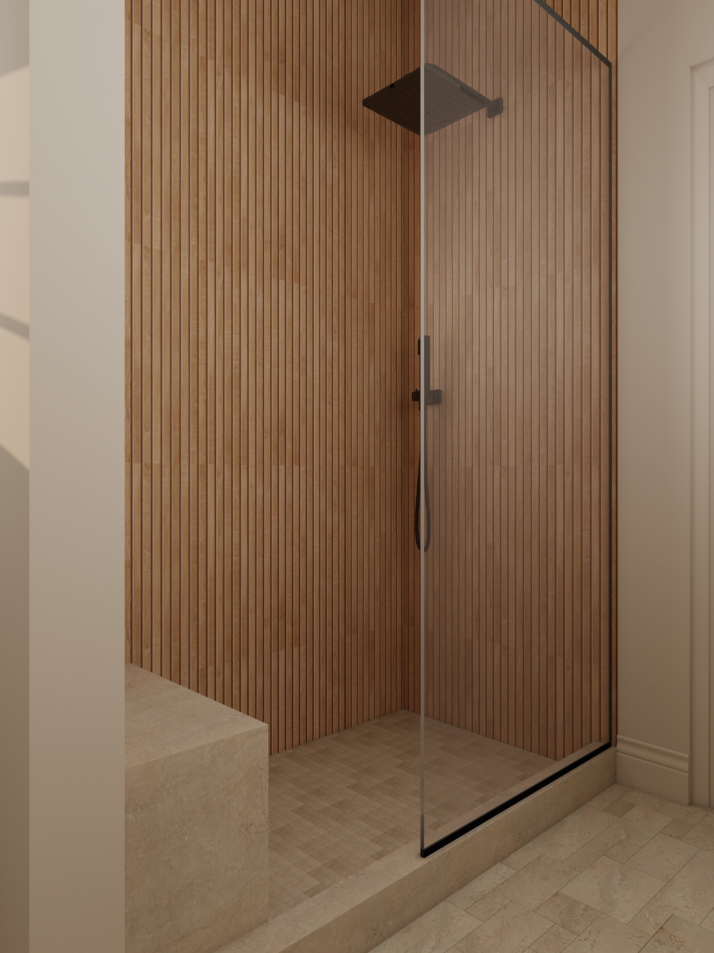 Modern glass shower with black showerhead and wood-paneled walls, located in a bathroom with beige tiles and a stone ledge.