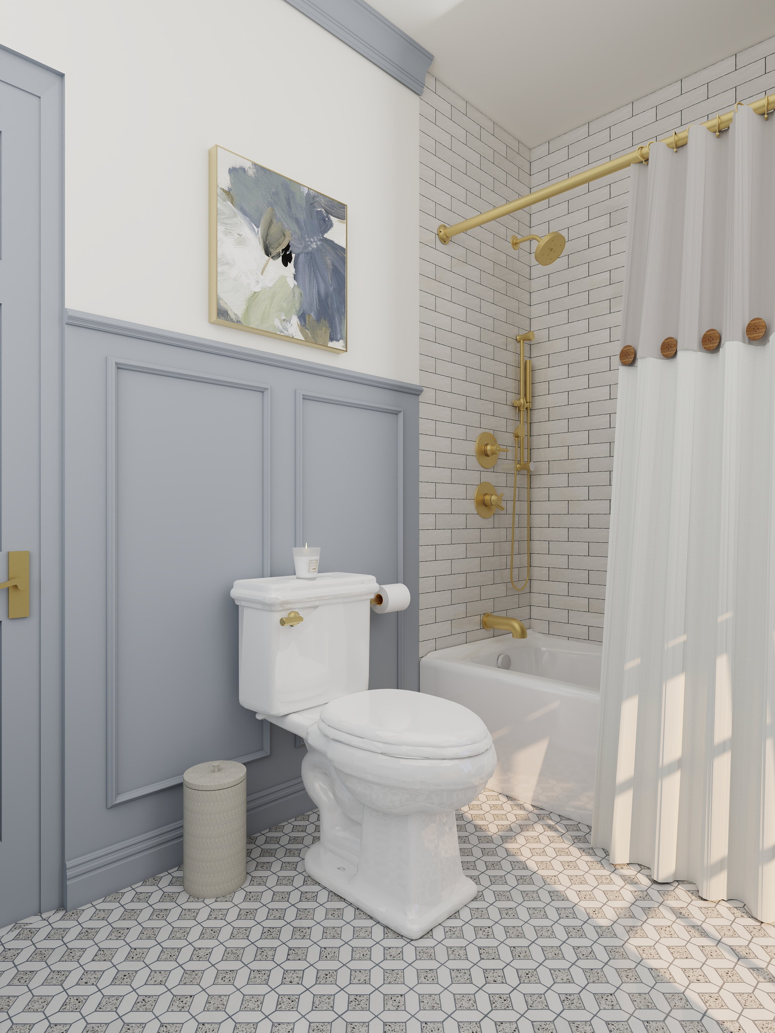 A modern bathroom with light blue wall paneling, a white toilet with a white lid, a small textured beige waste bin, a white and grey hexagon patterned tile floor, a painting of flowers hanging on the wall, a white bathtub with brass fixtures, a white