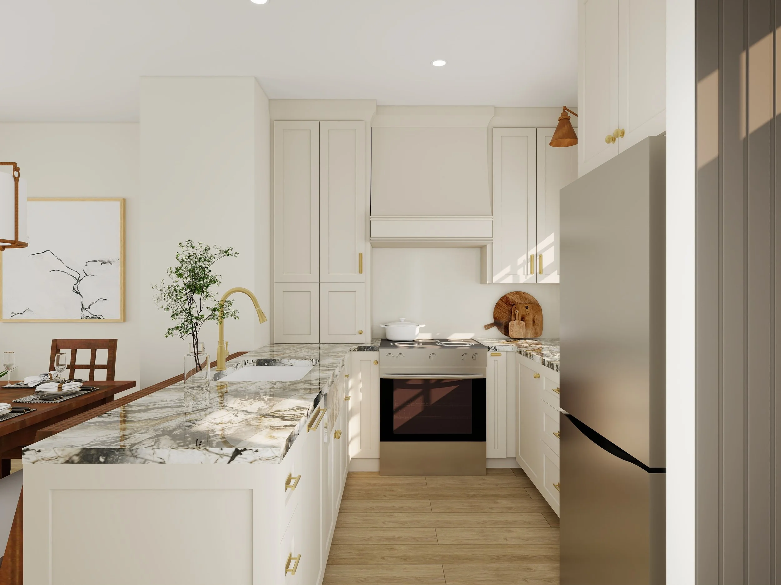 A modern kitchen with white cabinets, a marble island, and a black oven. There are small plants and wooden décor, natural light, and yellow hardware.