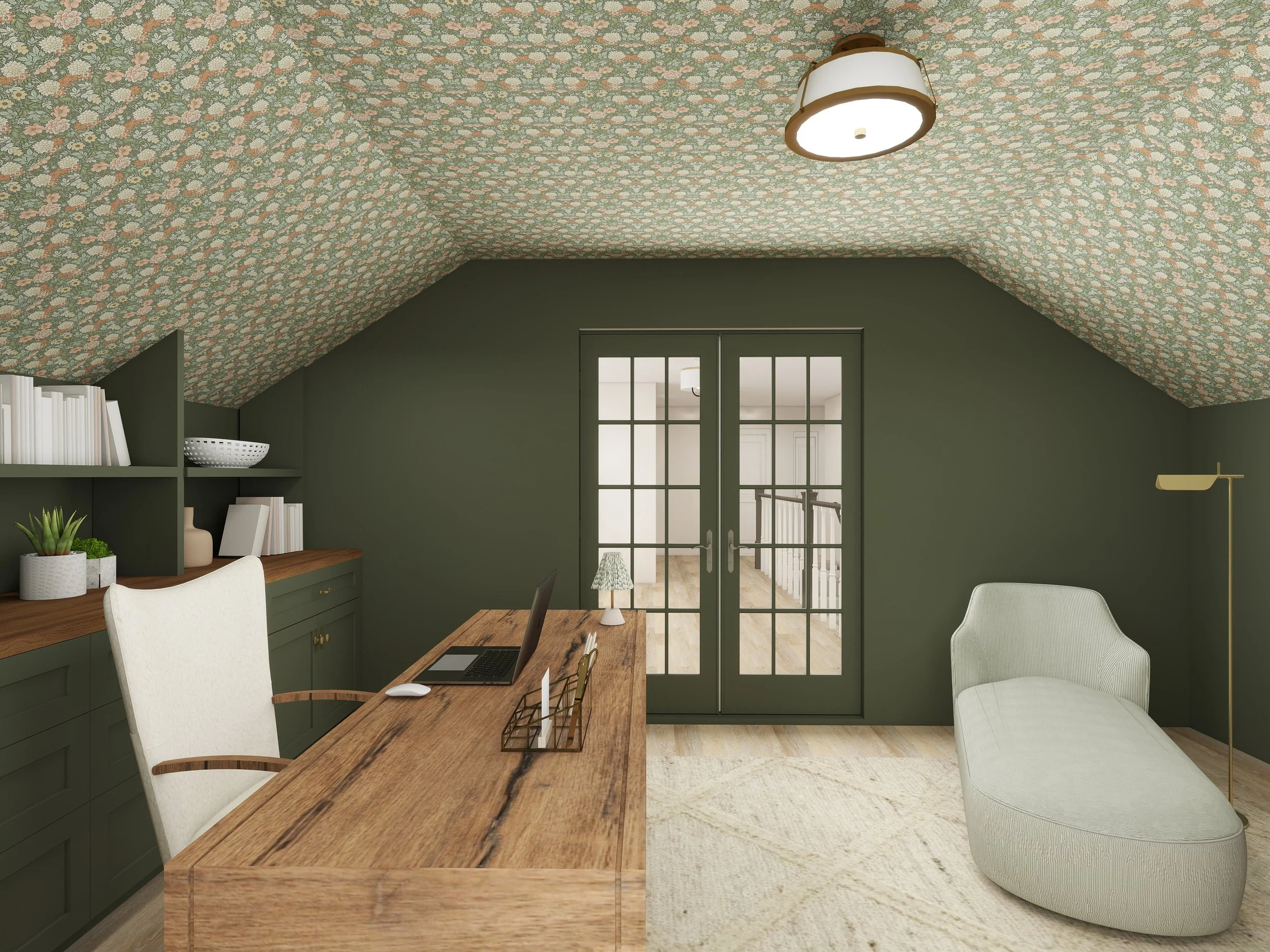 A cozy home office with green walls and a floral patterned ceiling. It features a wooden desk with a laptop, white chair, and decorative items like plant pots and a wire basket. There are glass double doors leading to a hallway, with a side table and