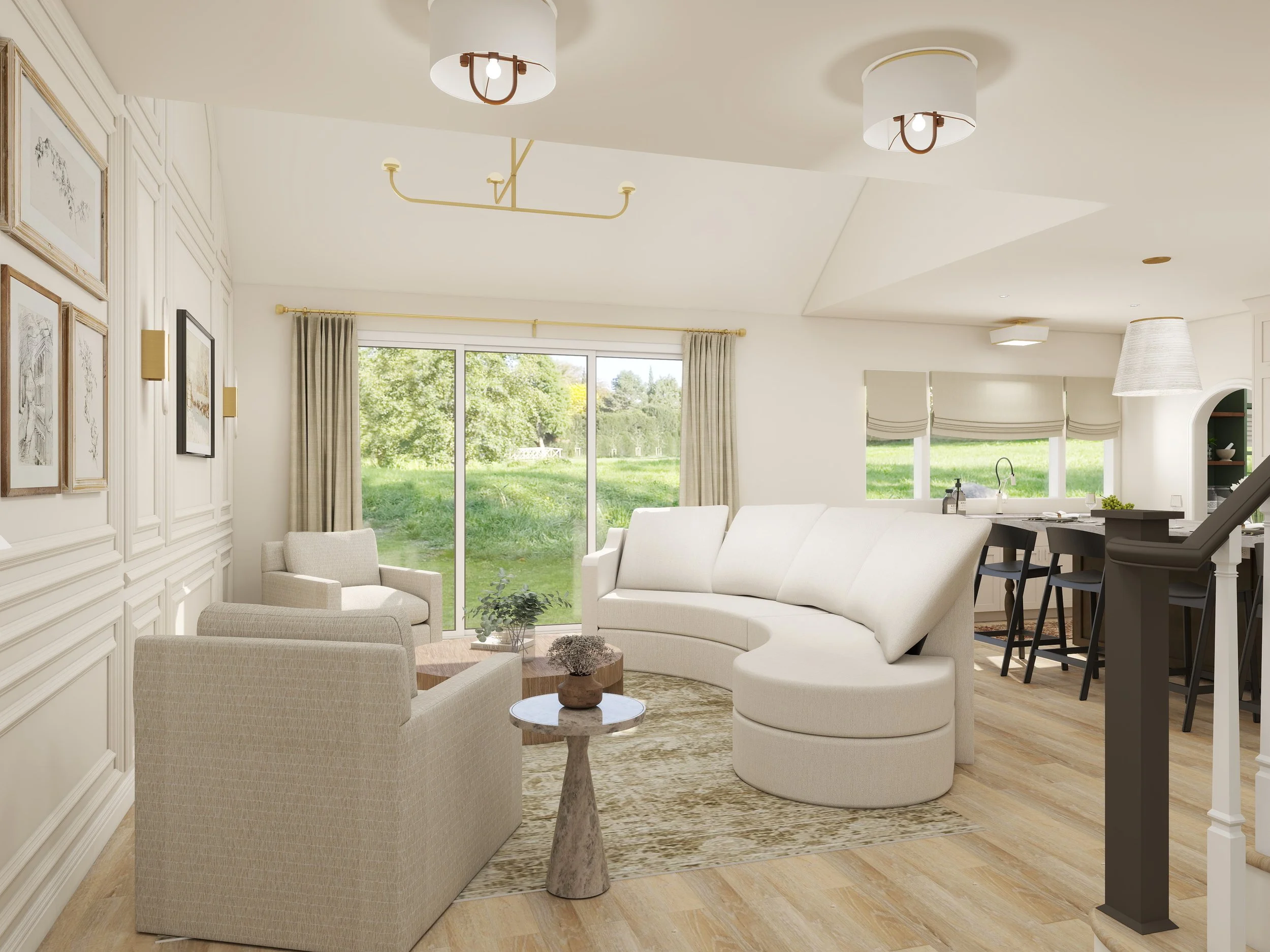 Bright living room with large windows showing green outdoor scenery, white sofa, cream armchairs, small round table with plant, hanging and ceiling light fixtures, and a view into the kitchen area.