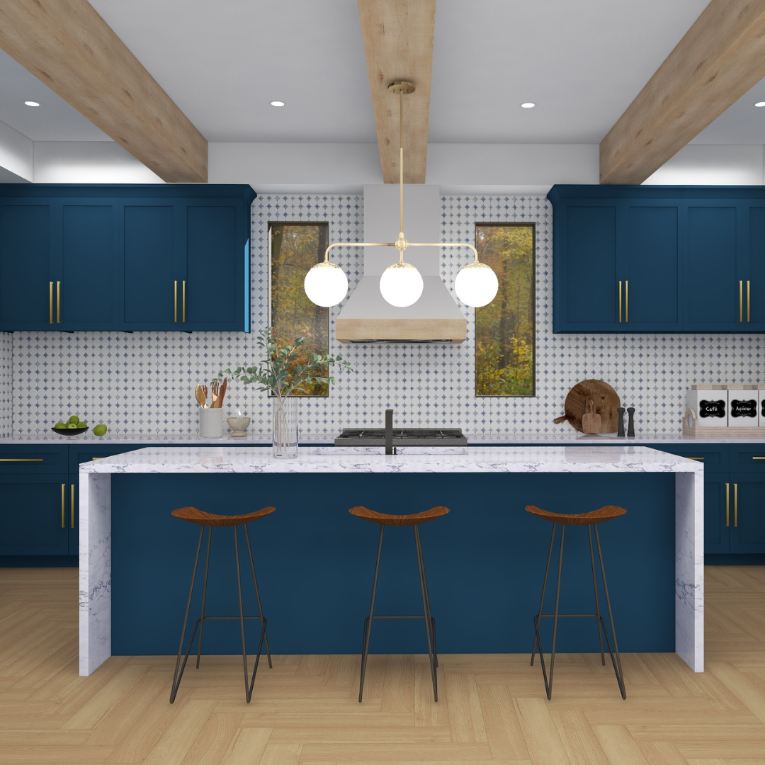Modern kitchen with blue cabinets, white marble island, wooden stools, and patterned backsplash, with two windows showing an outdoor view of trees.