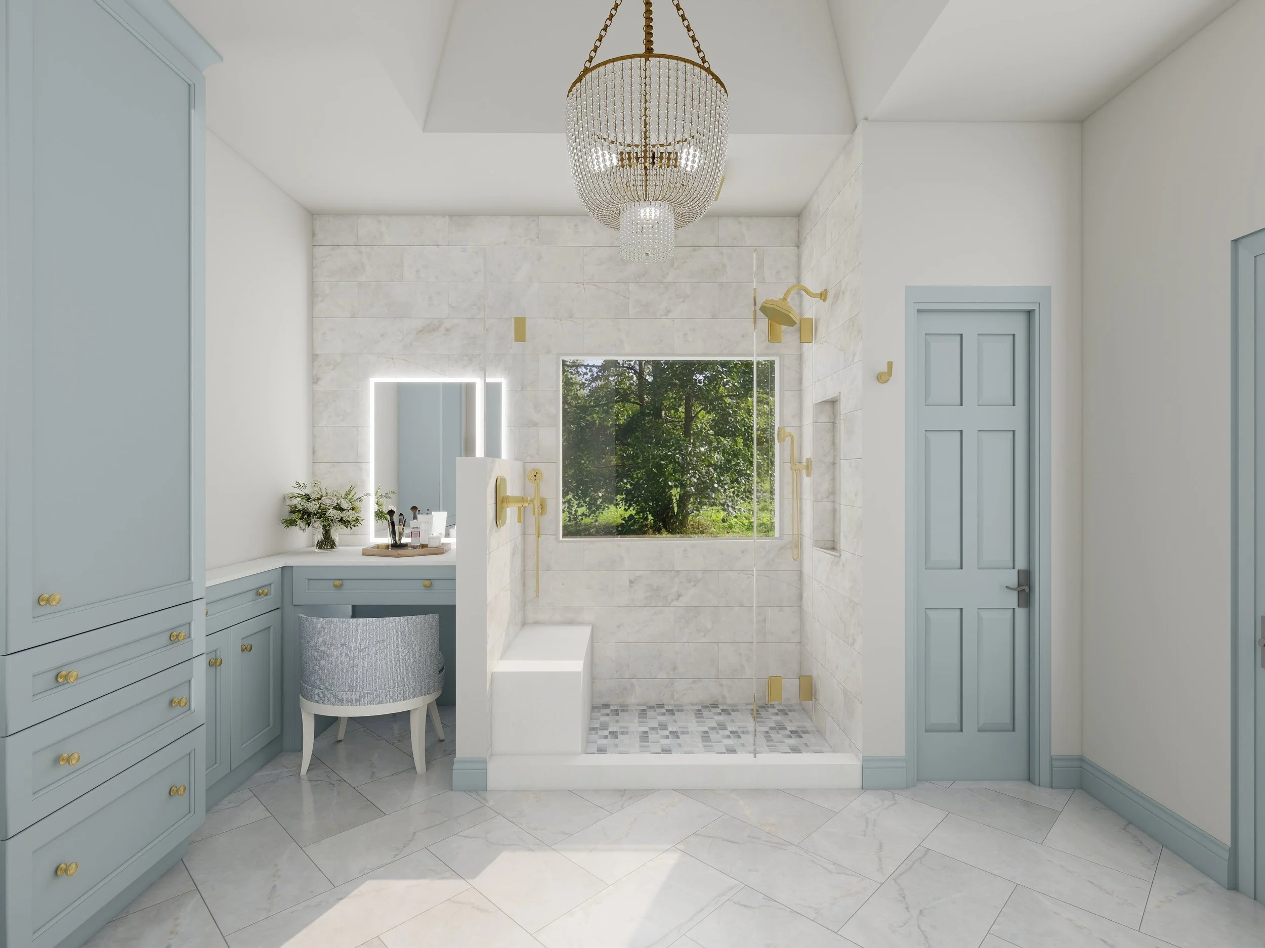 A bright, modern bathroom with a white marble shower area featuring a glass enclosure and gold fixtures, a large window showing green trees outside, and pastel blue cabinetry with gold knobs.