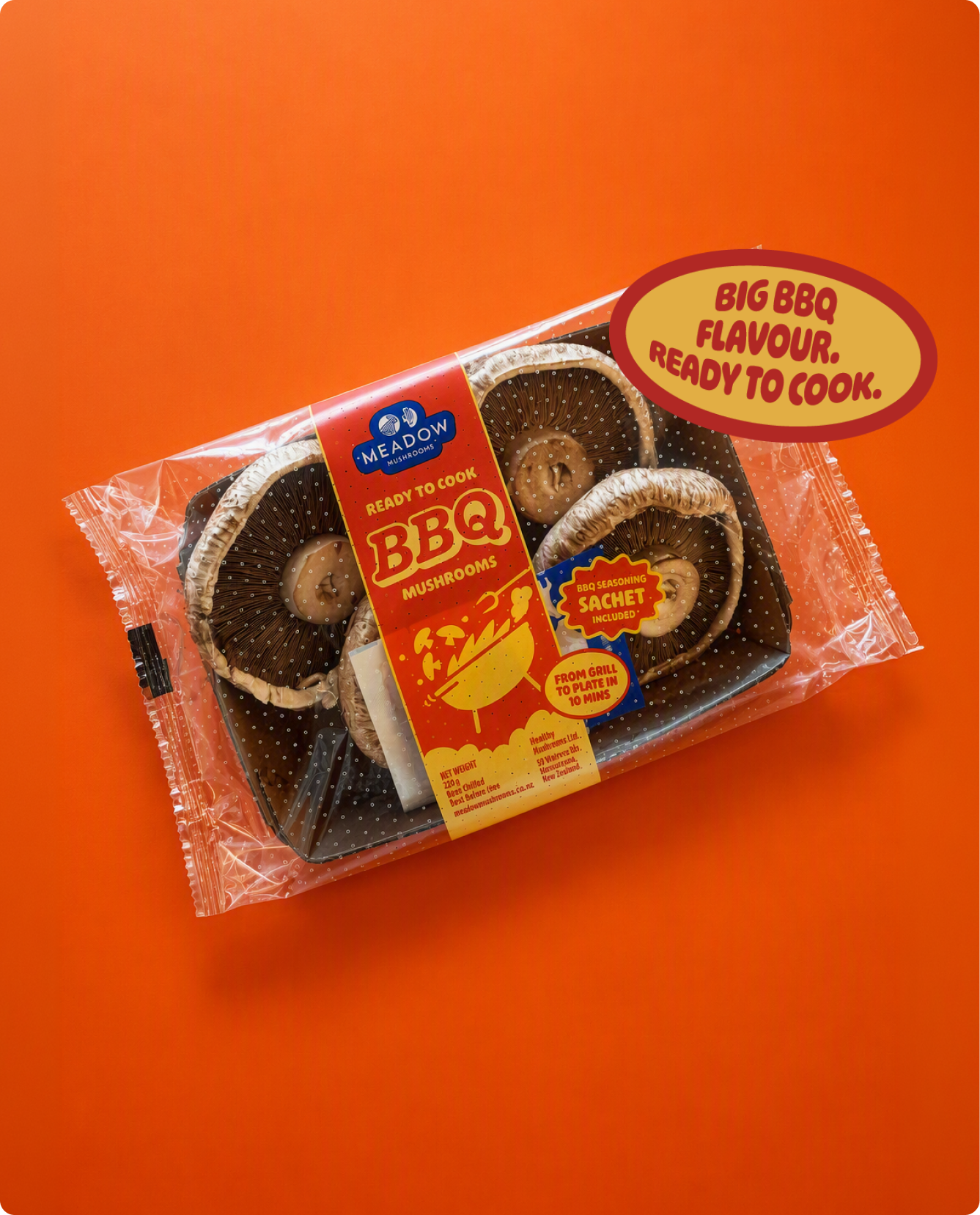 Packaged BBQ mushroom mushrooms from Meadow with a label indicating it is ready to cook, including a barbecue seasoning sachet, on an orange background.