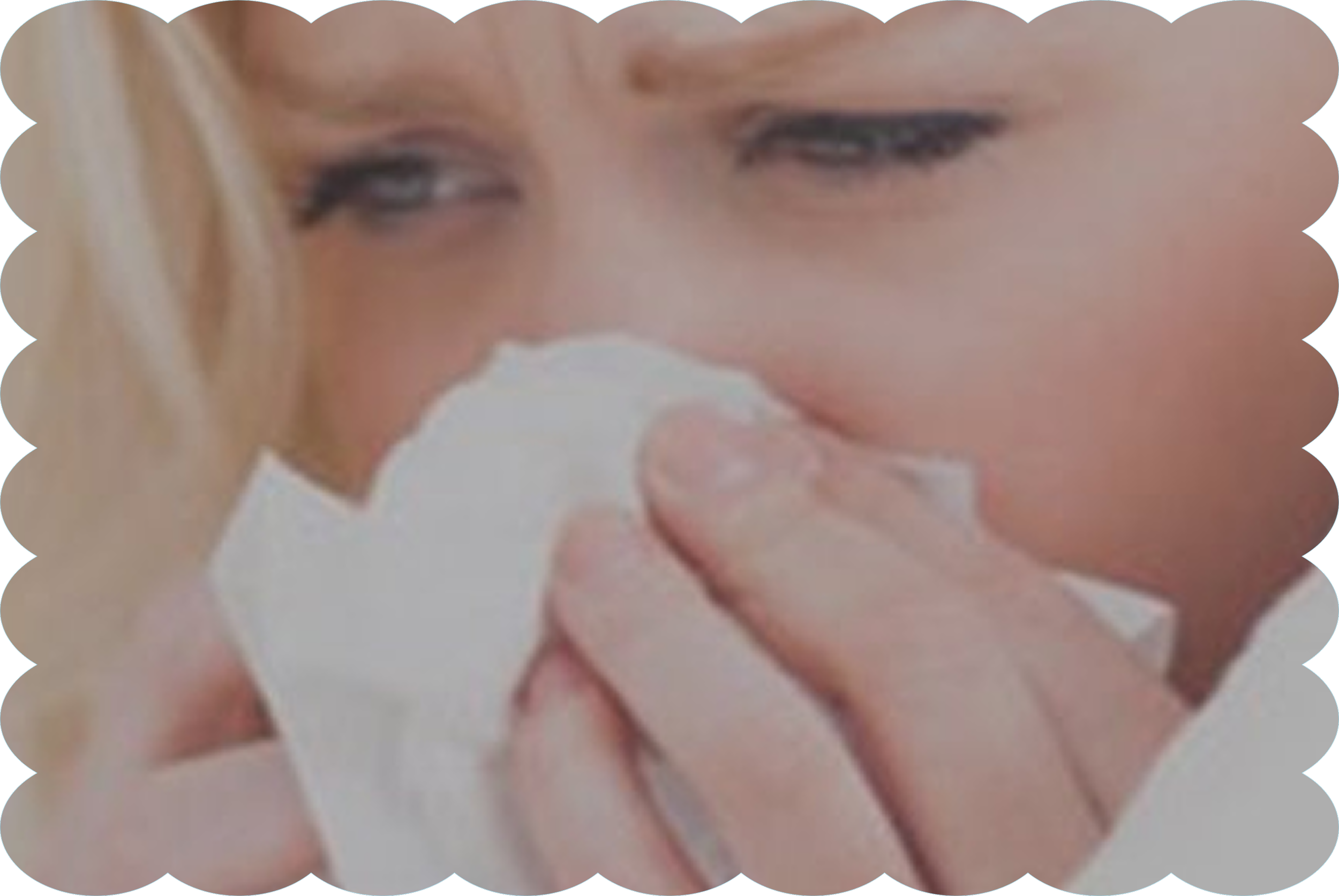 Close-up of a person's face with distinctive eye makeup and white gloves, possibly holding something near their mouth.