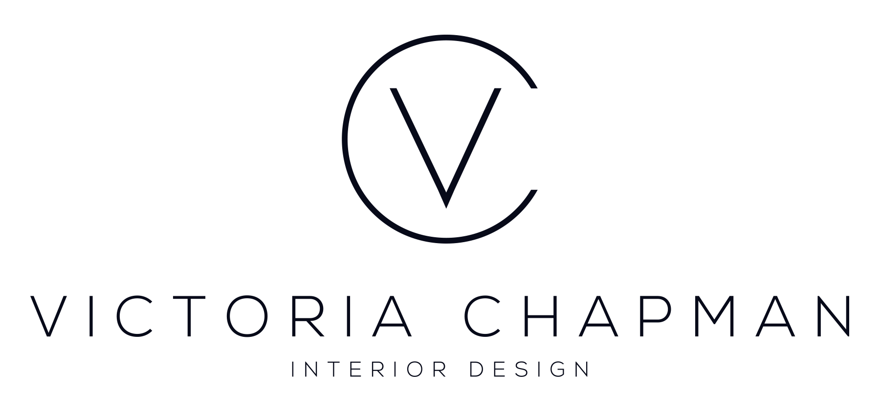 Logo for Victoria Chapman Interior Design, featuring a circular emblem with a stylized 'V' and 'C' intertwined, and the company name written beneath.