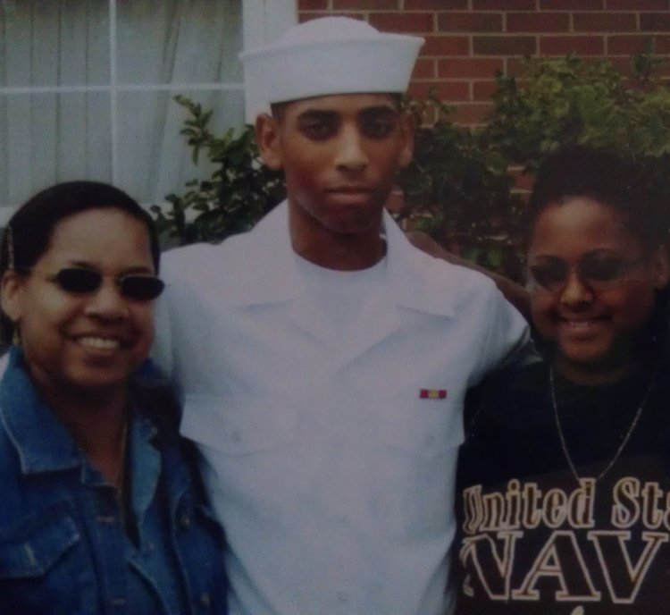 Rashad Houston with his mom and sister at his Navy boot-camp graduation in Great Lakes, Illinois.