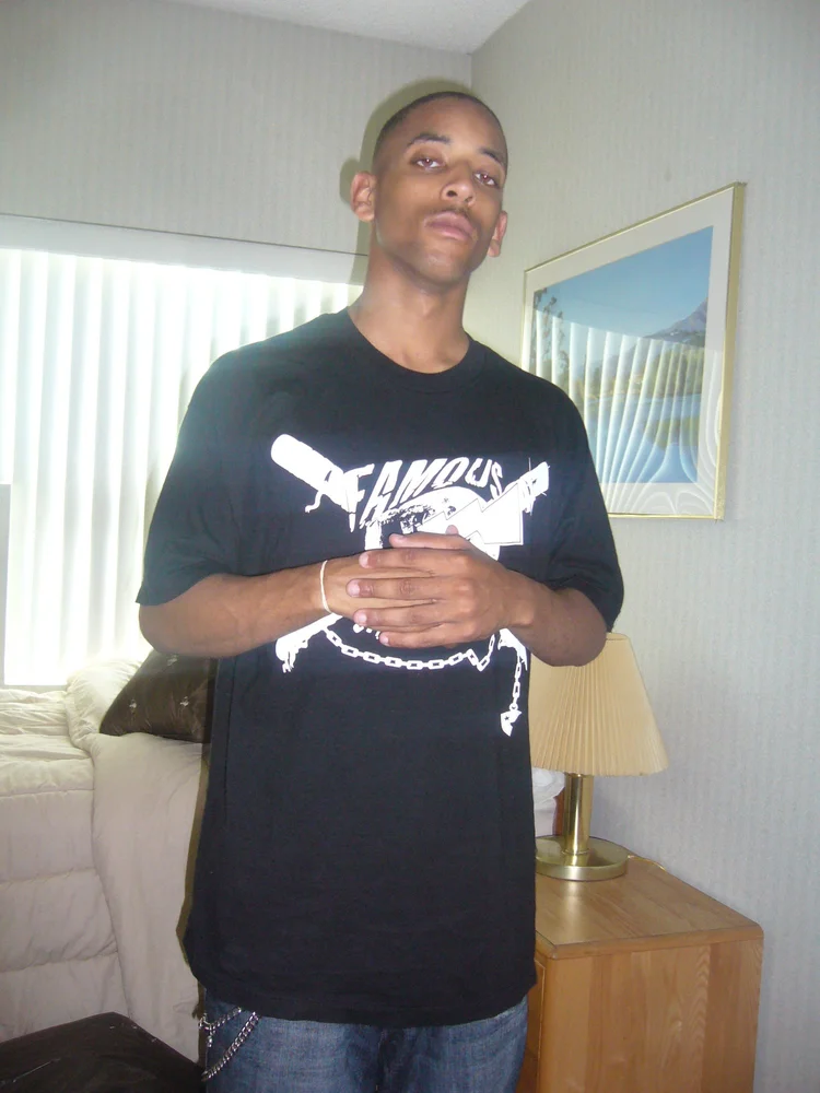 An early portrait in a black shirt
