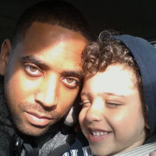 A father and son close together