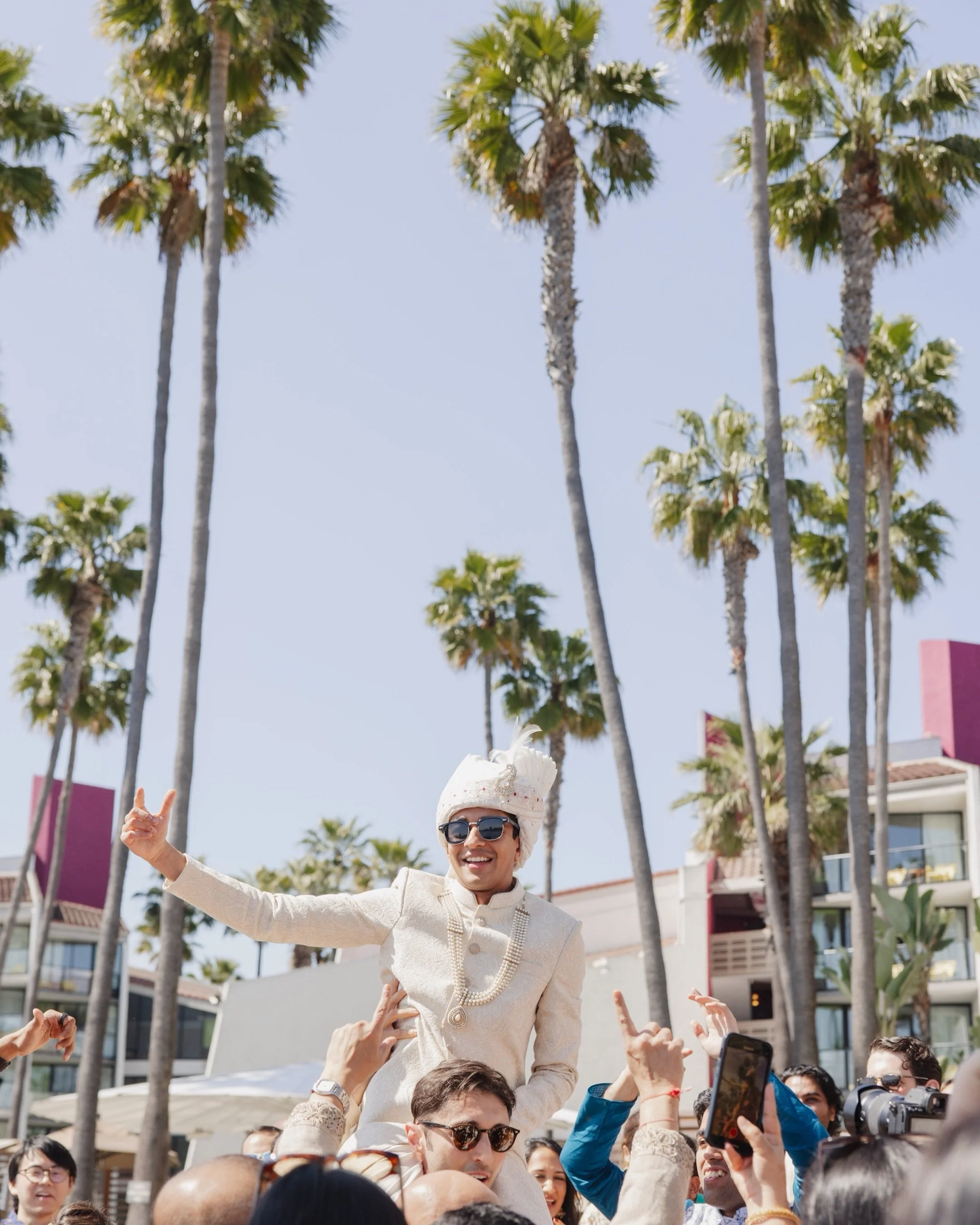 Baraat hit different when your groom pulls up on a boat 
-
Palm trees, stylish fits, and a crowd that did NOT come to play! This baraat at Hotel Maya Long Beach was pure magic. The energy was electric from the moment the procession started. With fami