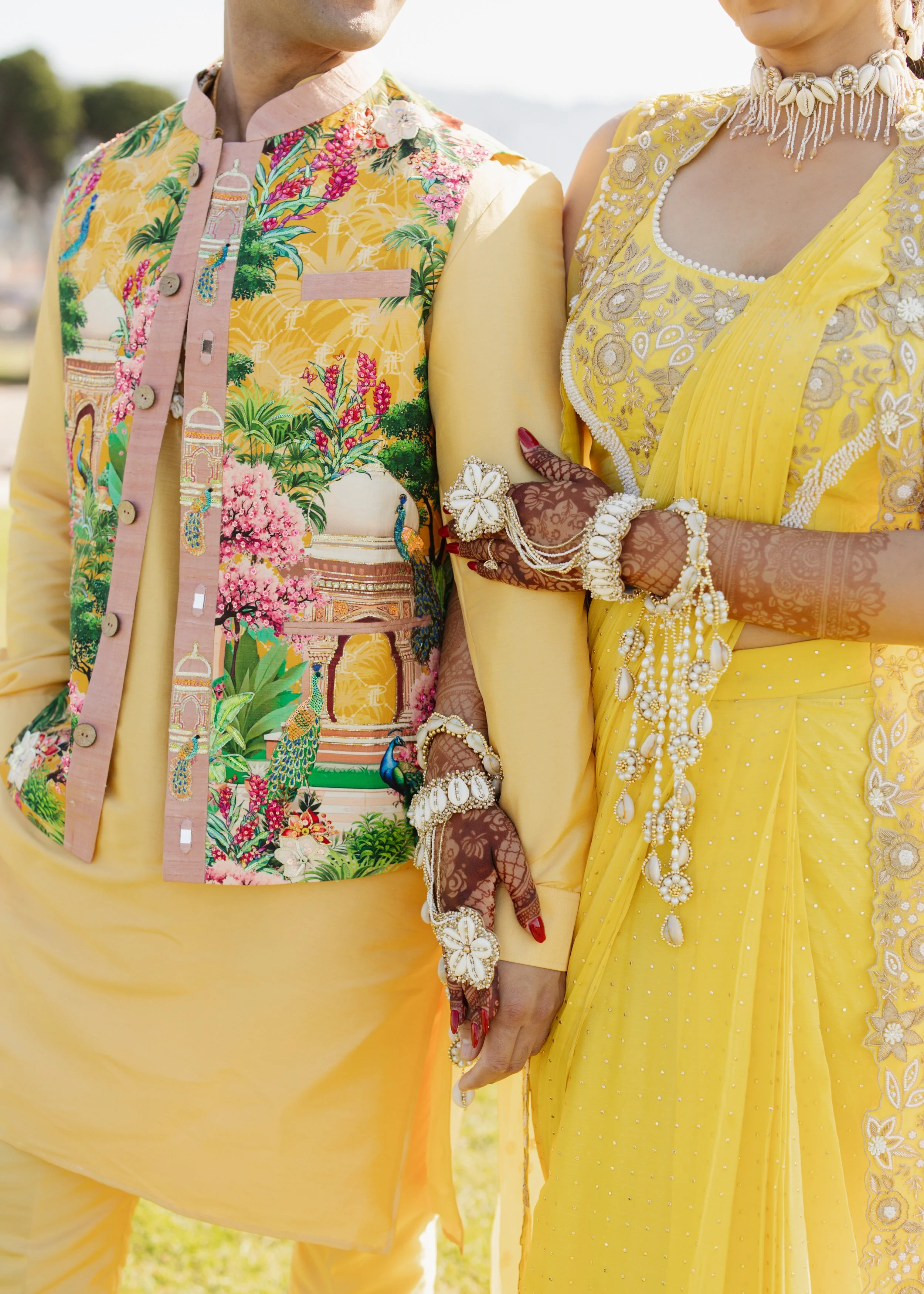  Bride in yellow outfit during haldi ceremony, Orange County wedding photographer 