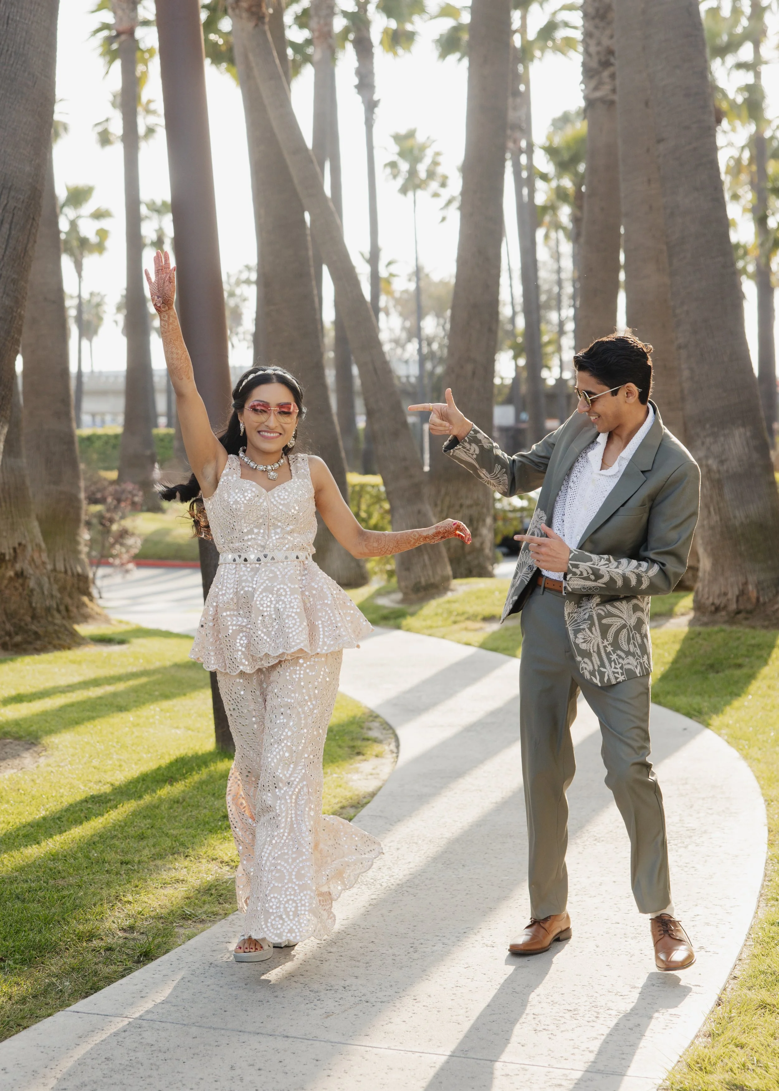 Bride and groom dancing during sangeet celebration, Long Beach South Asian wedding 