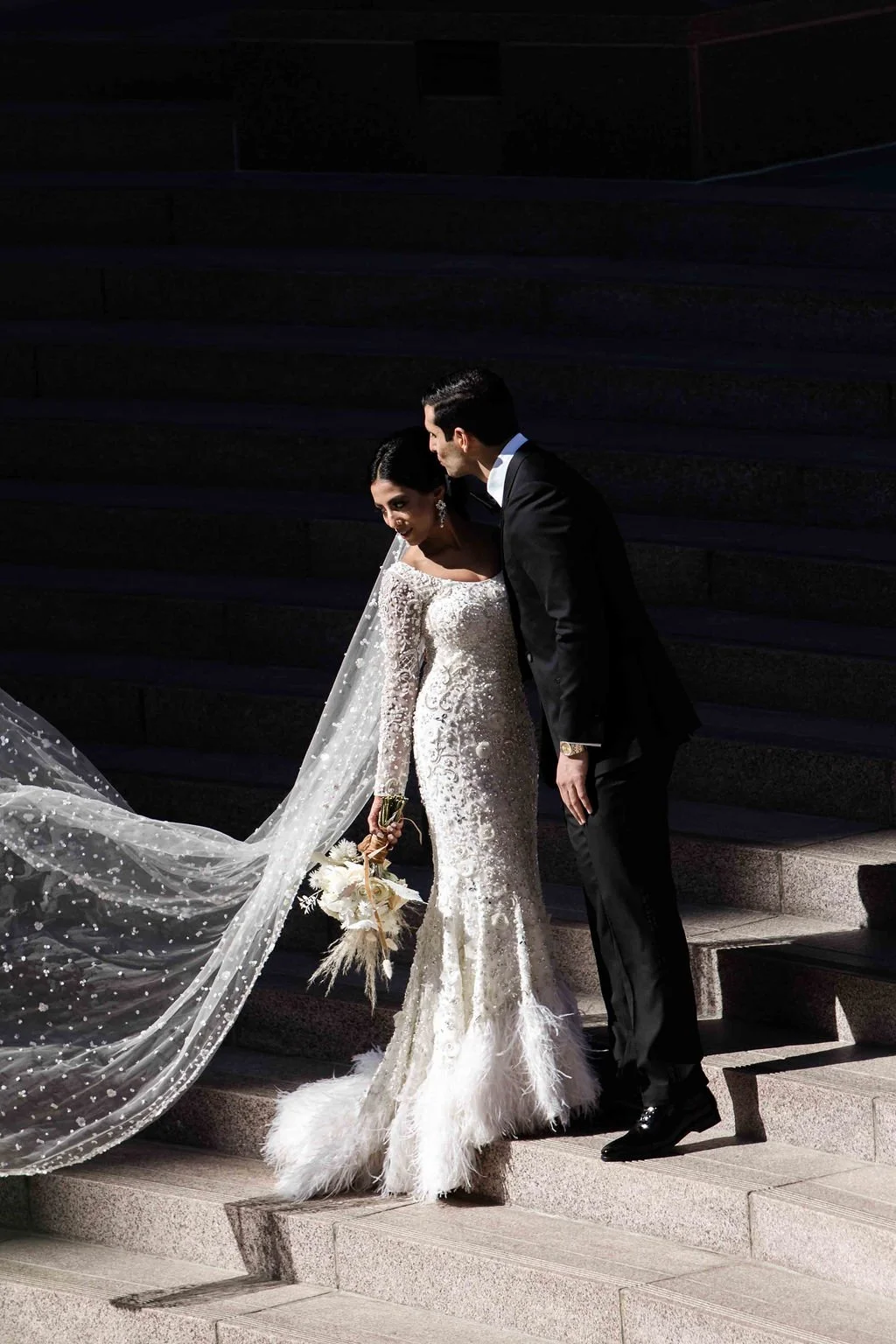 bride and groom posing for their first look, after their nikkah ceremony