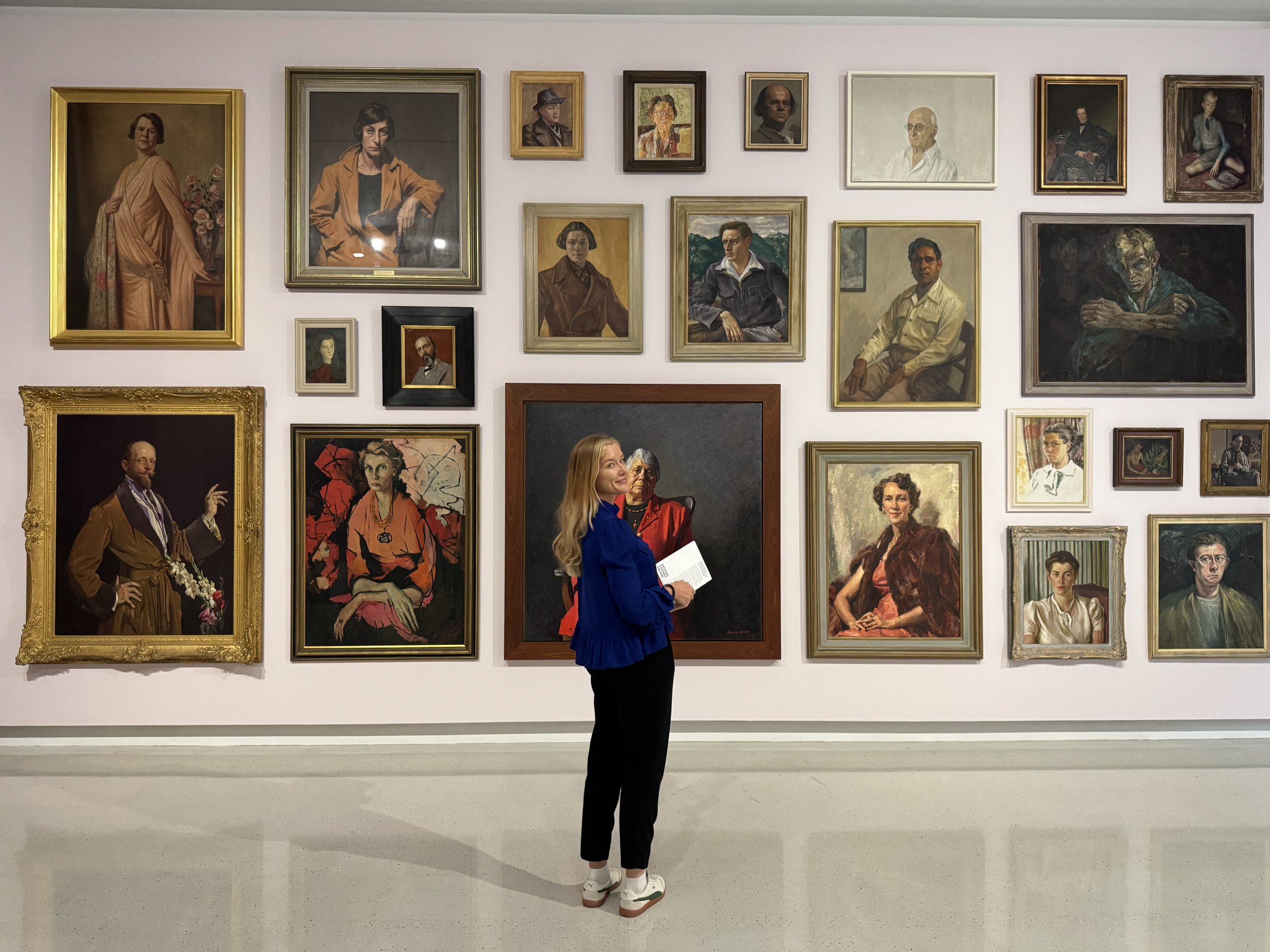 In 2025, I did my first photoshoot at Parliament House. This is me taking a little art break at a local gallery. 
