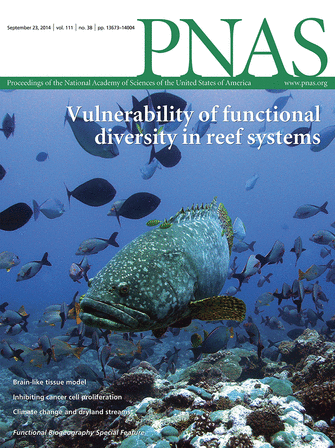 Cover of PNAS journal featuring an underwater scene with a large fish and smaller fish swimming around coral reef, with the title 'Vulnerability of functional diversity in reef systems'.