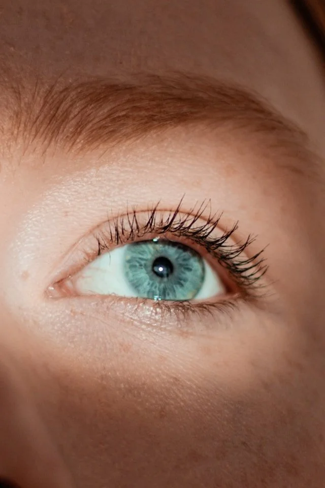 A close up of a bright blue eye.