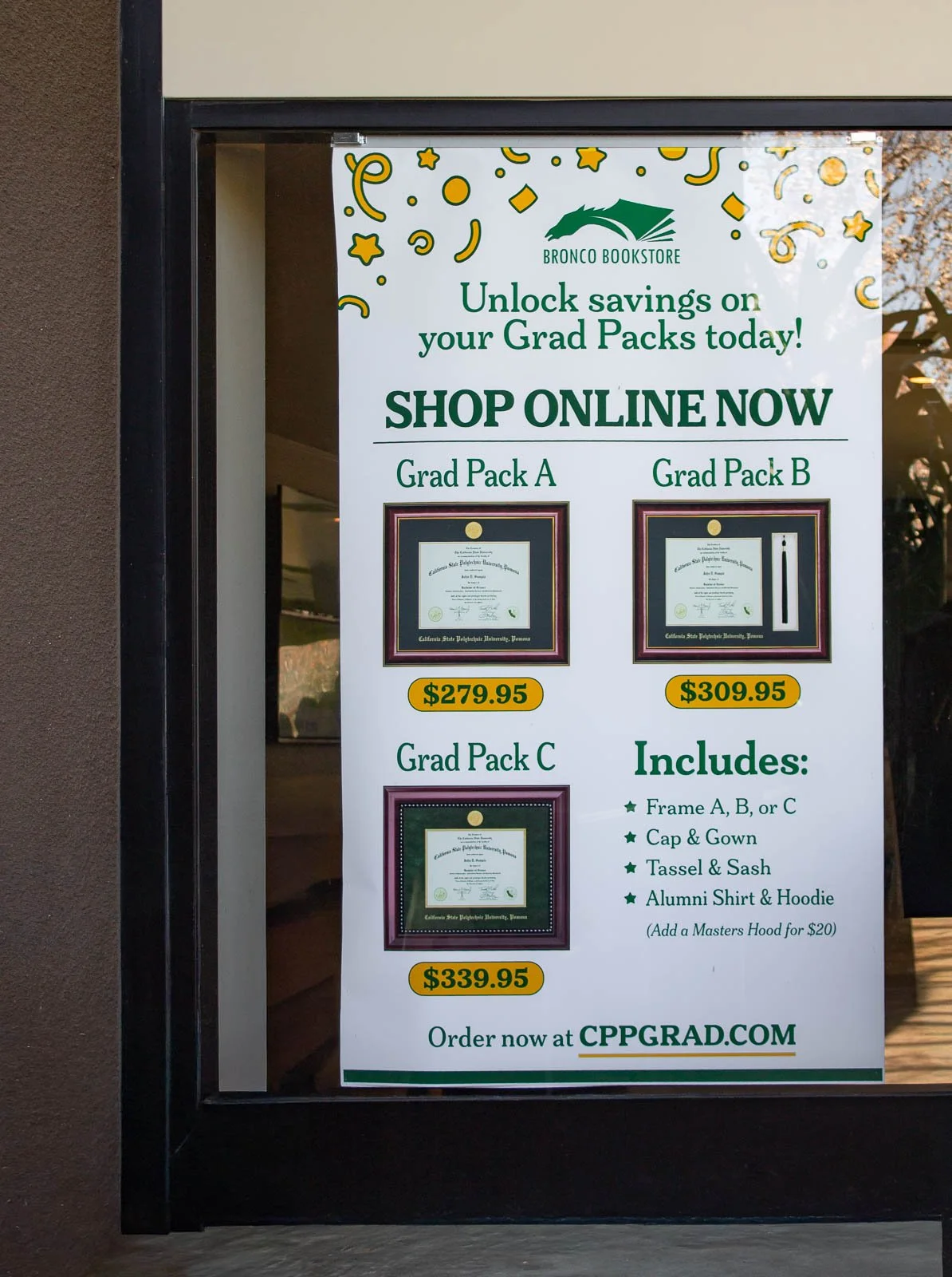 A poster advertising graduation pack options from Bronco Bookstore, including prices and what they contain, with an online shop link.