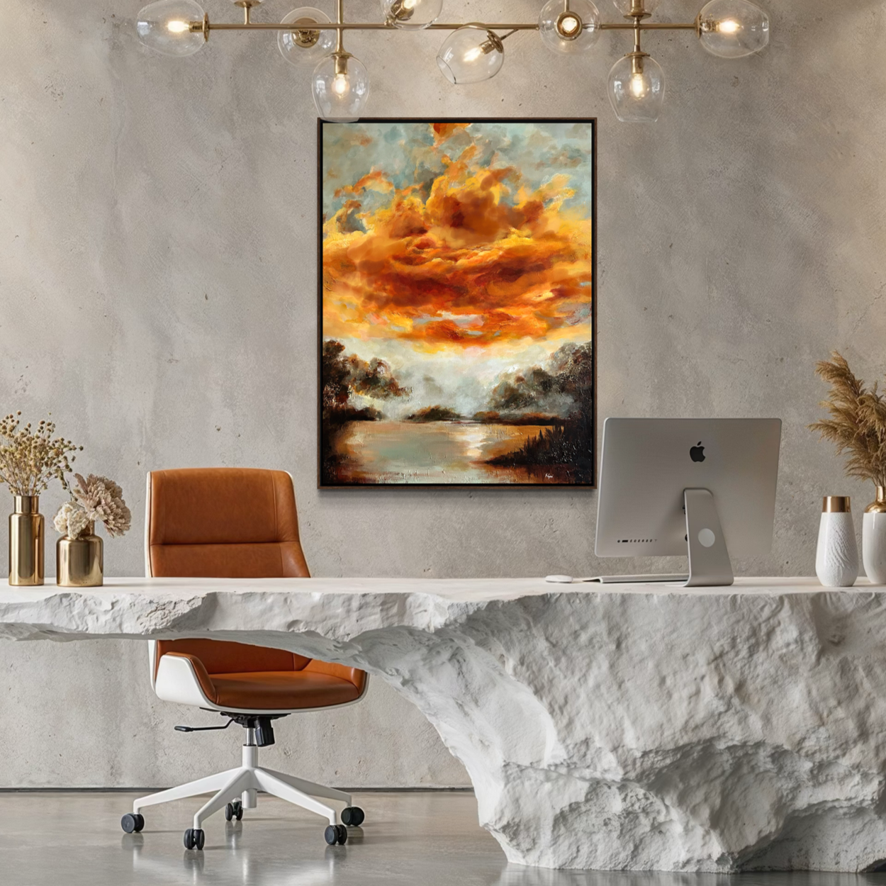 Modern office with white textured desk, orange chair, gold and white vases with dried flowers, abstract landscape painting with orange clouds, and an Apple computer on a minimalist. light-colored wall.