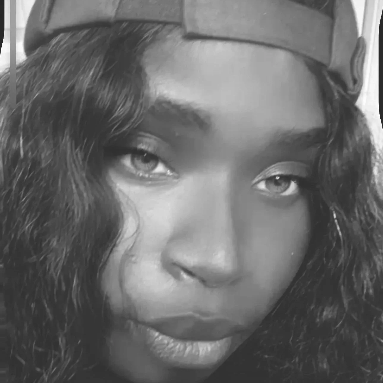 Headshot of Ayana: Professional loctitian at The Nappy Hutt