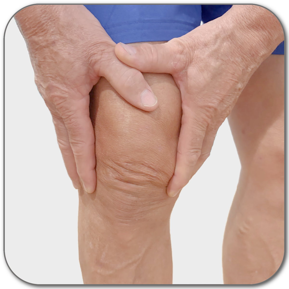 Close-up of a person's knee with hands on suggesting knee pain.