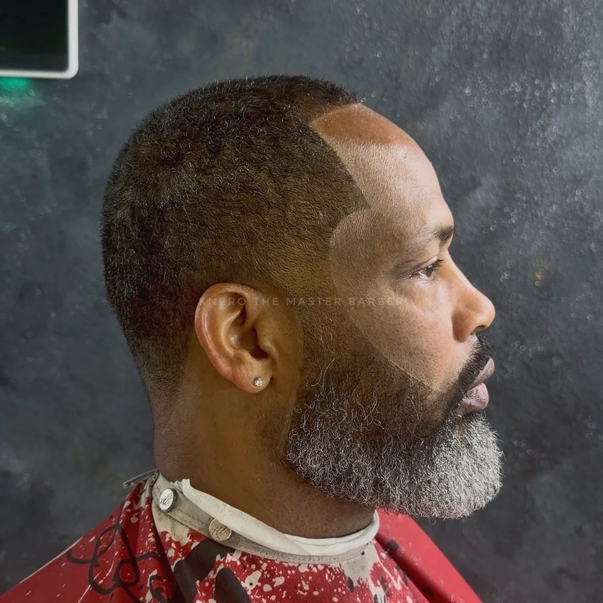 Low fade and beard trim for men at kNERO’s Styles of Luxury barbershop The Colony Texas