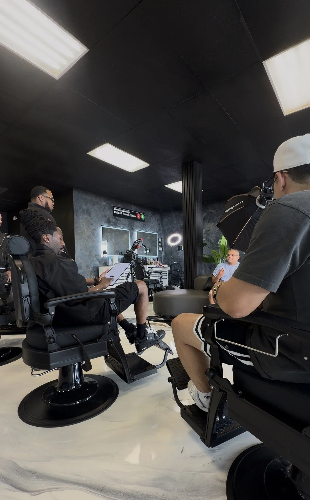 kNERO and the team creating barber content inside kNERO’s Styles of Luxury, a luxury barbershop in The Colony, TX serving Frisco, Plano, and North Dallas with premium men’s haircuts, fades, beard grooming, and professional barber services.